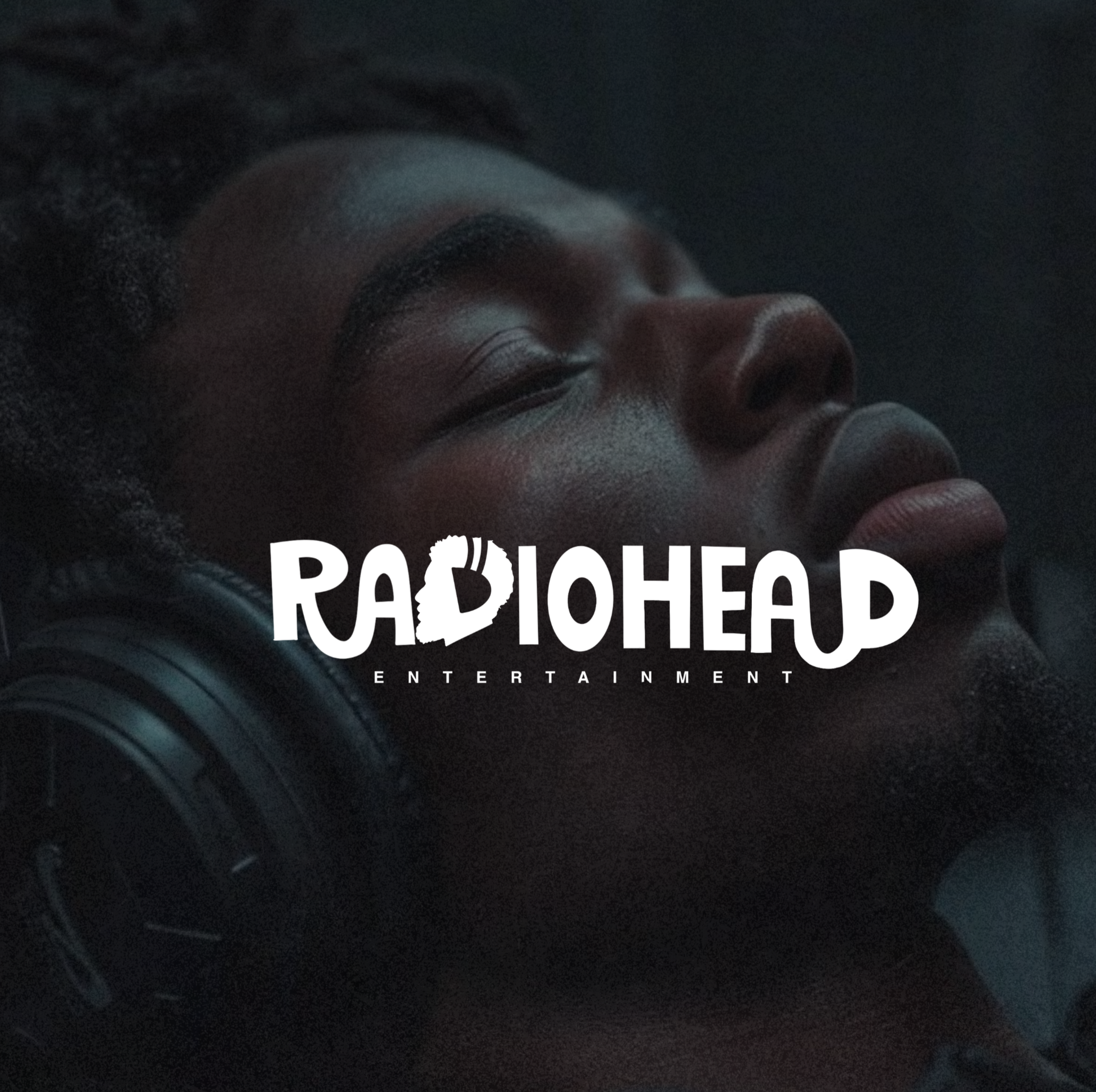 Close-up of a person wearing headphones with the Radiohead Entertainment logo over their face.