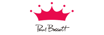 Pink crown with small circles on tips, with the name 'Paul Bassett' written below in black script.