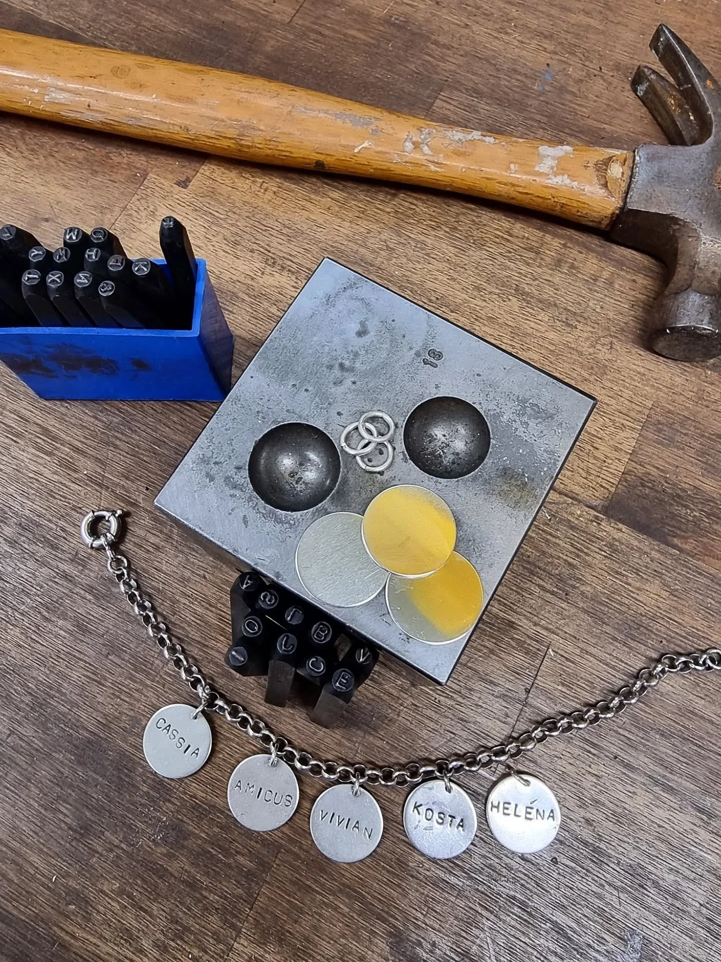 CUSTOM MADE - this bracelet is back in the studio for a little TLC and an update with 3 more name charms being added.

The names represent the 8 grandchildren of my customer. 

If you are looking for a custom-made design for a Christmas gift, now is 