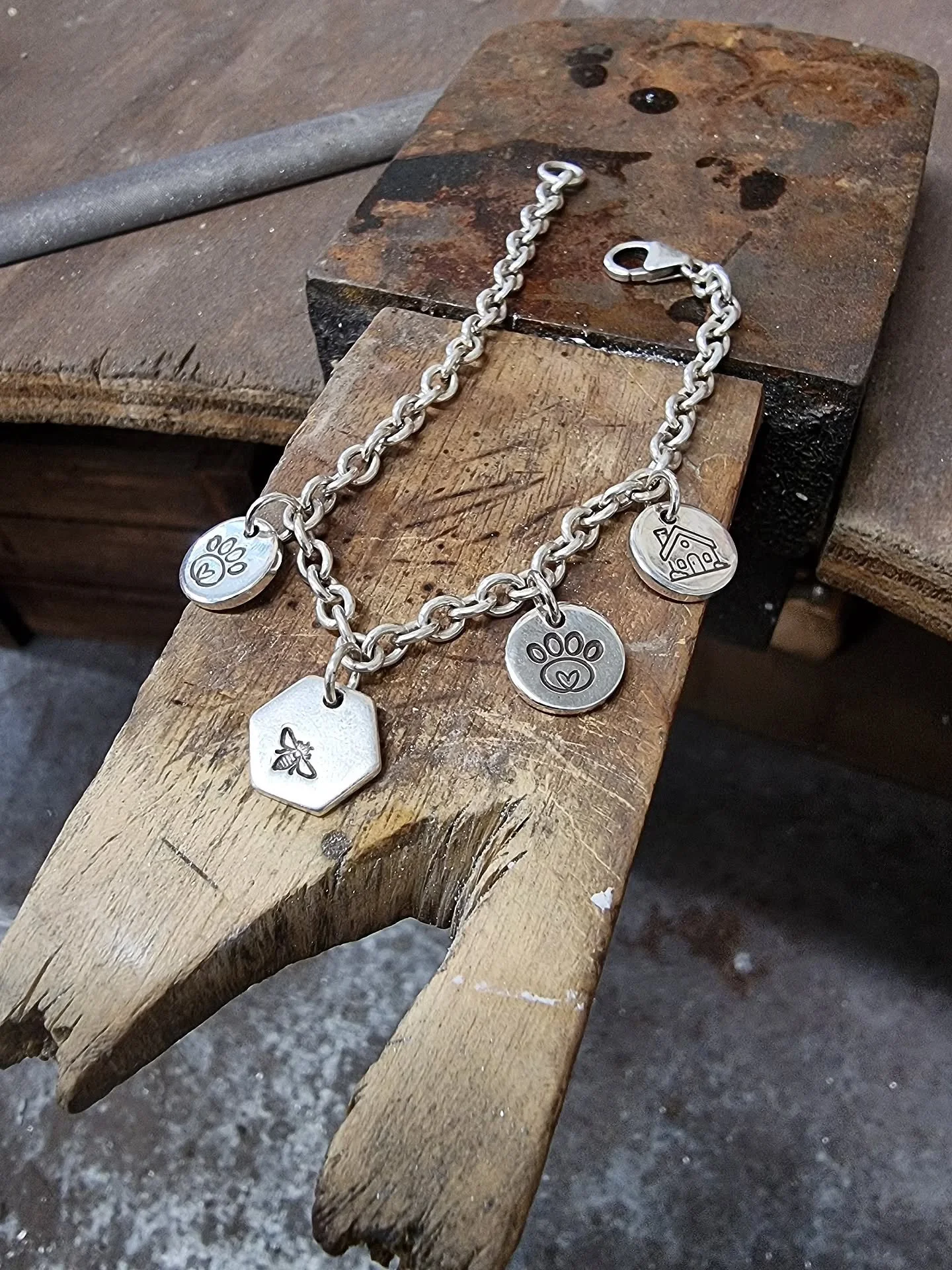 CHARMED - 5 years ago, I made my niece a bracelet with a little bee stamped charm on it, with a message to: 
🐝 kind

🐝 brave

🐝 you!

To my utter delight, she has rarely taken it off. For Christmas, I gave it an update with some new charms
🐾 2 pa
