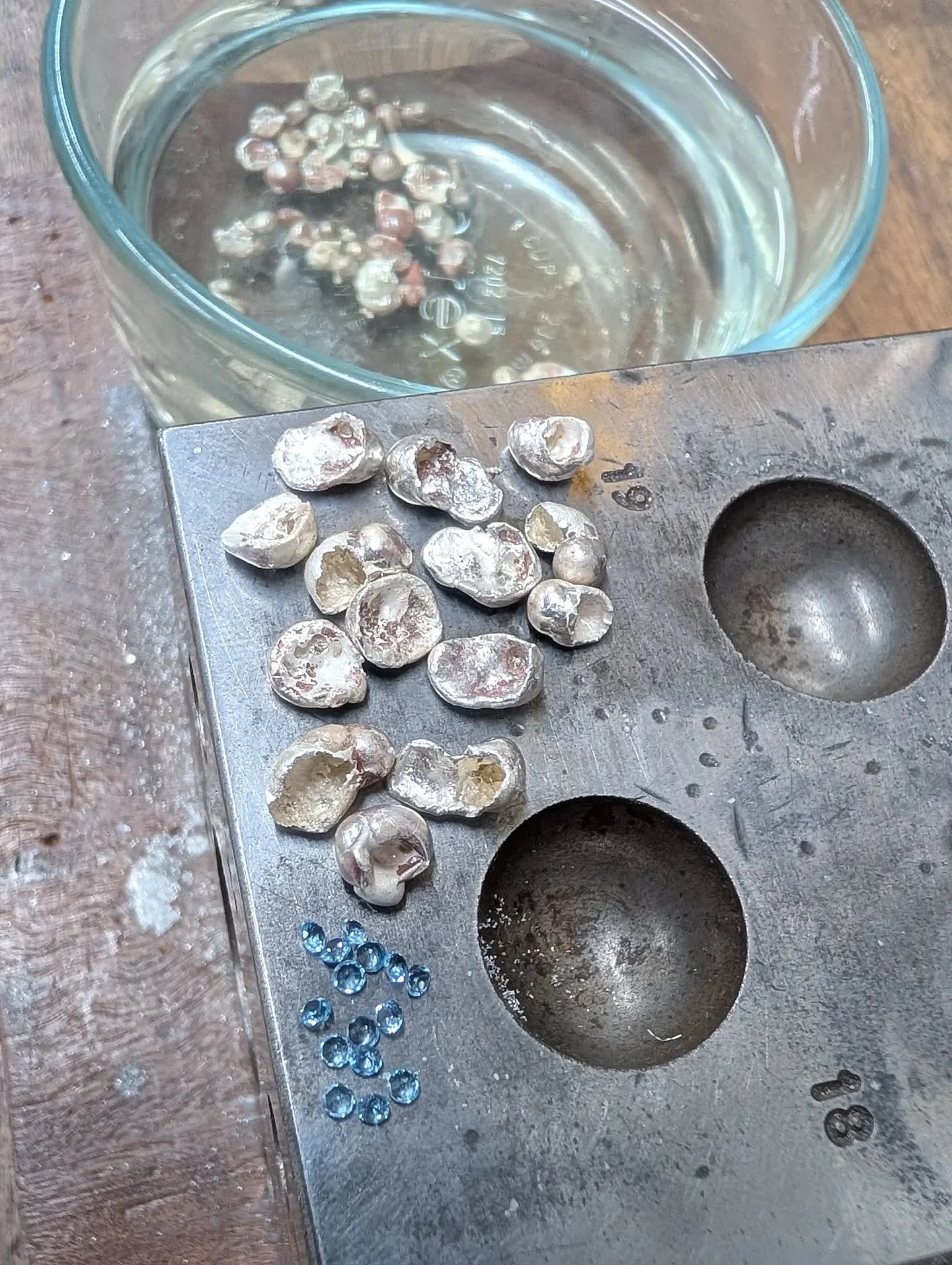 MOLTEN RAIN - I can't stop thinking about what I am going to create with these little water cast blobs. Next week I'm going to melt some silver scrap into a crucible and pour the molten metal into the water to try and get some bigger pieces to work w