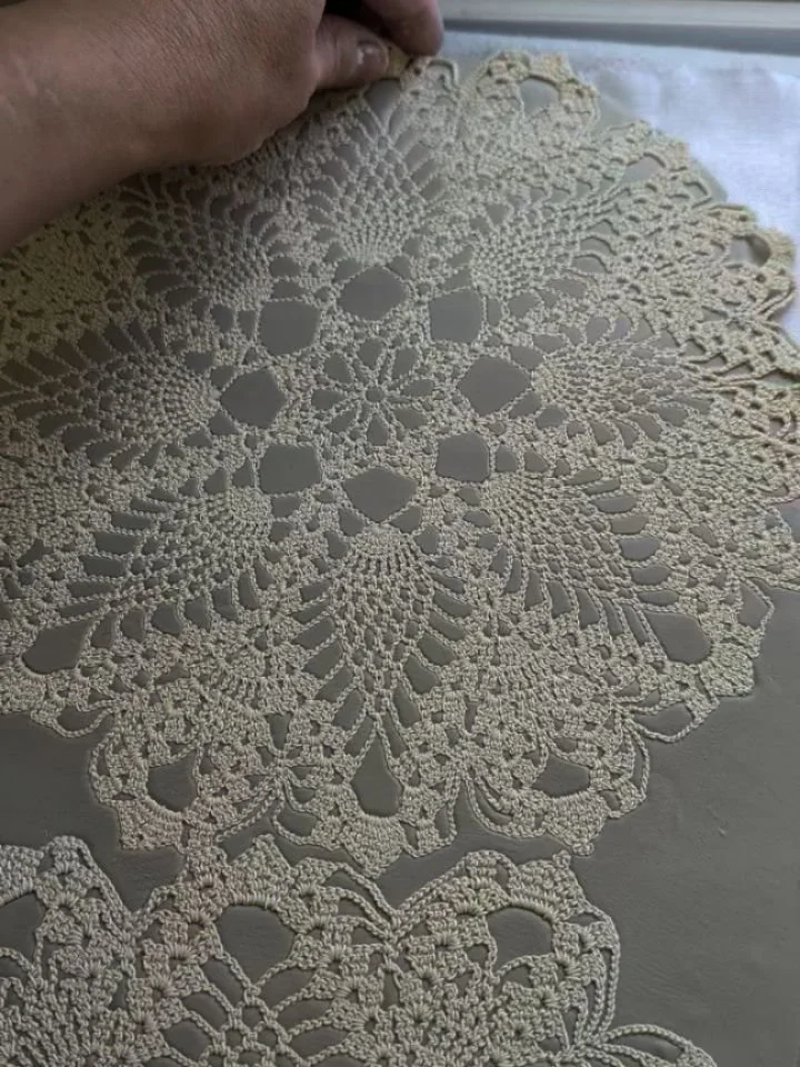 LACE TEXTURED ceramic decorations are in production. I had such an enjoyable day making these today. The hours just melted away as I kneaded, rolled, cut and smoothed the clay.

Candle stick holders and more candle plate stands are next on the to mak