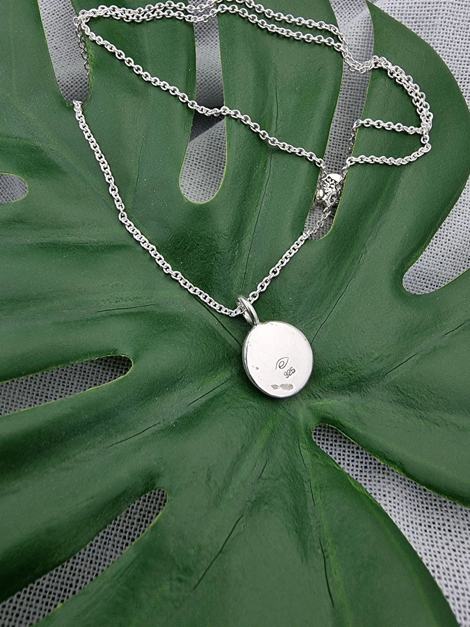 recycled-silver-monstera-necklace (4).jpg