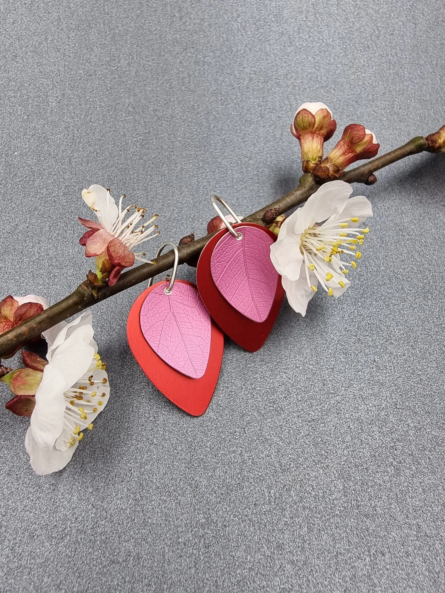 A SPRING FLING – Pink leaf on red earrings