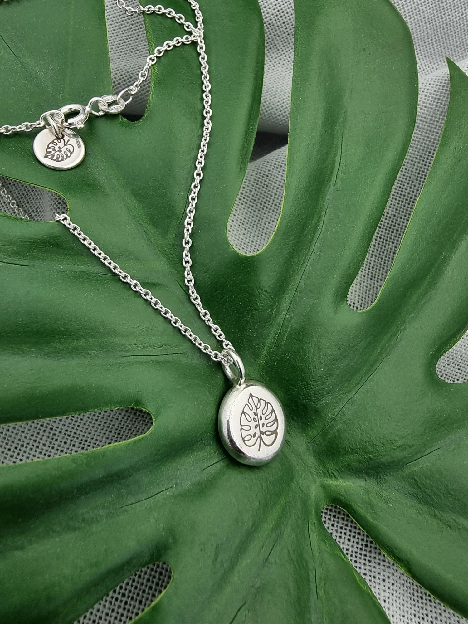 recycled-silver-monstera-necklace (2).jpg