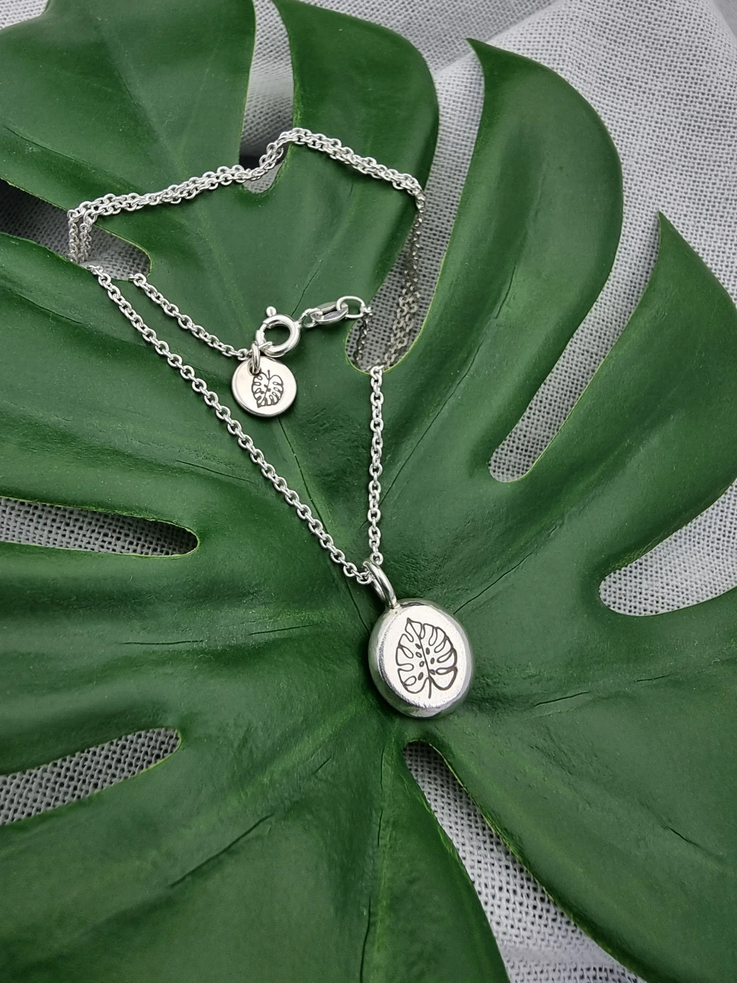 recycled-silver-monstera-necklace (6).jpg