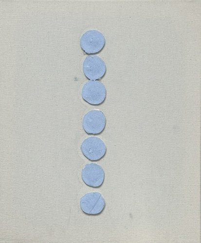 Seven blue tablets lined up vertically on a light-colored surface.
