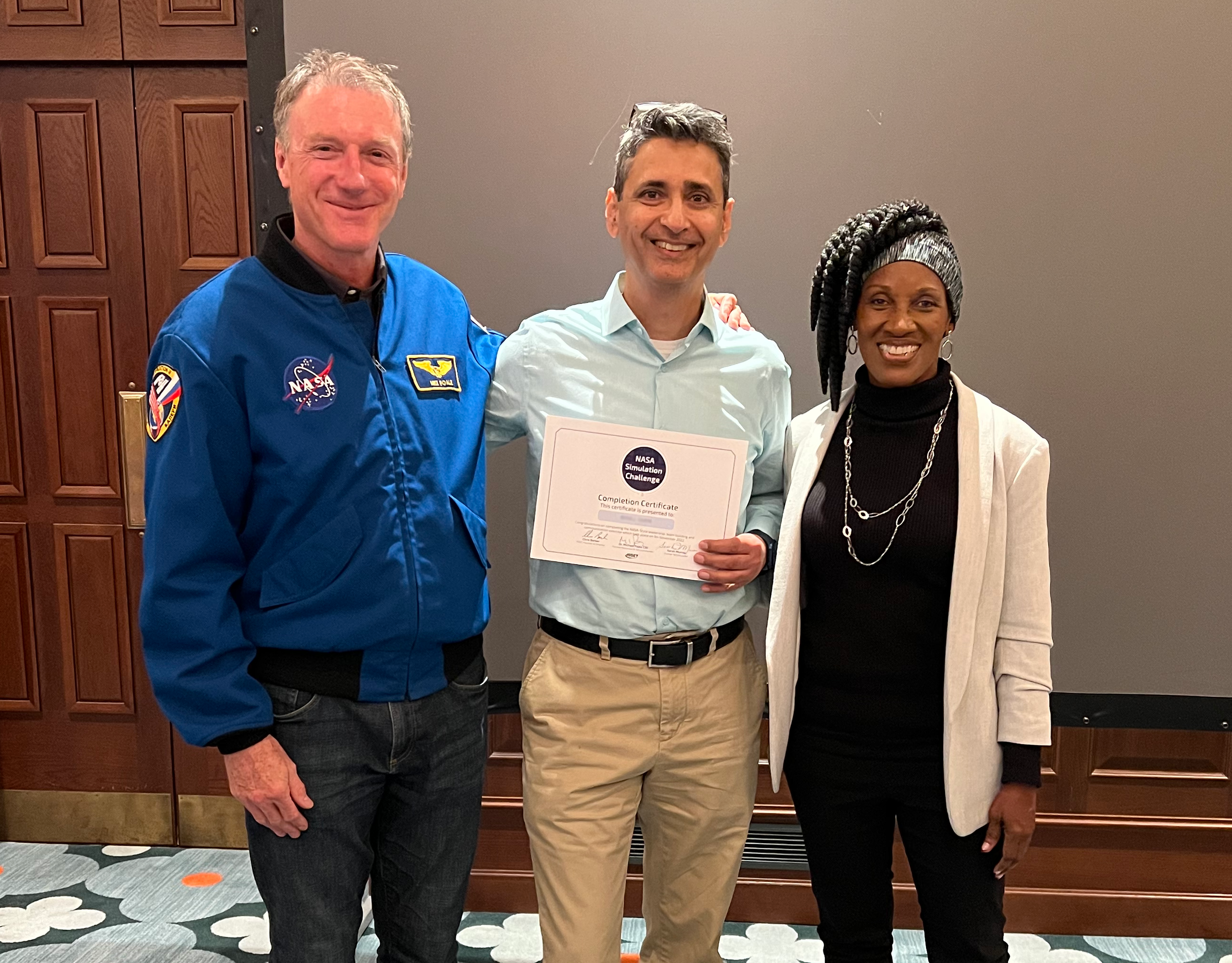 Astronaut-Michael-Foale & NASA-Leader-Sarah-Murray with particpant-on-the-nasa-style-simulation-leadership-programme.png