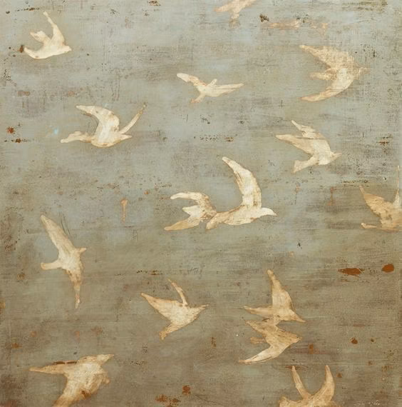 Faded wall mural of flying birds in muted tones.