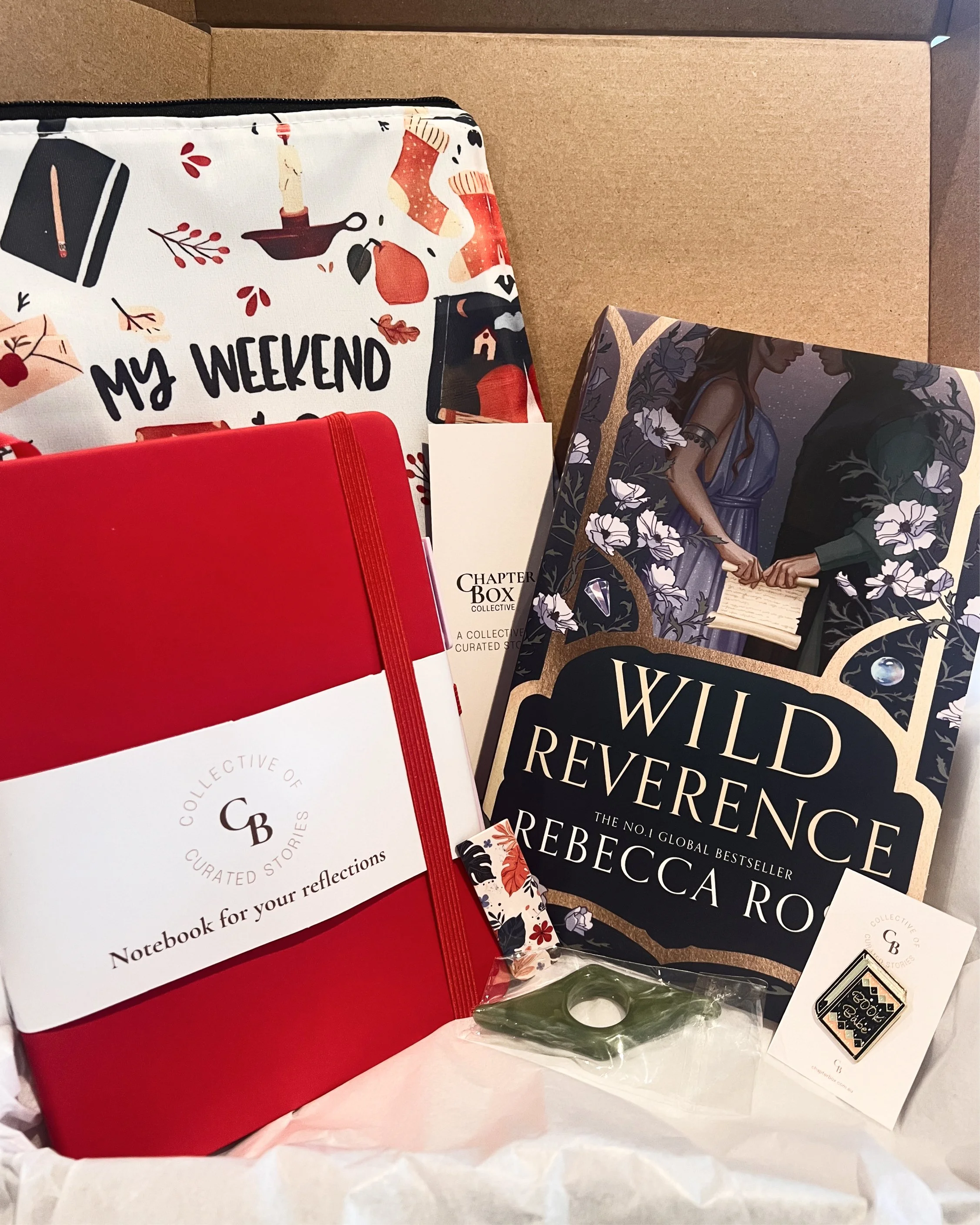 Book box with book, book sleeve, notebook, pin and bookmark