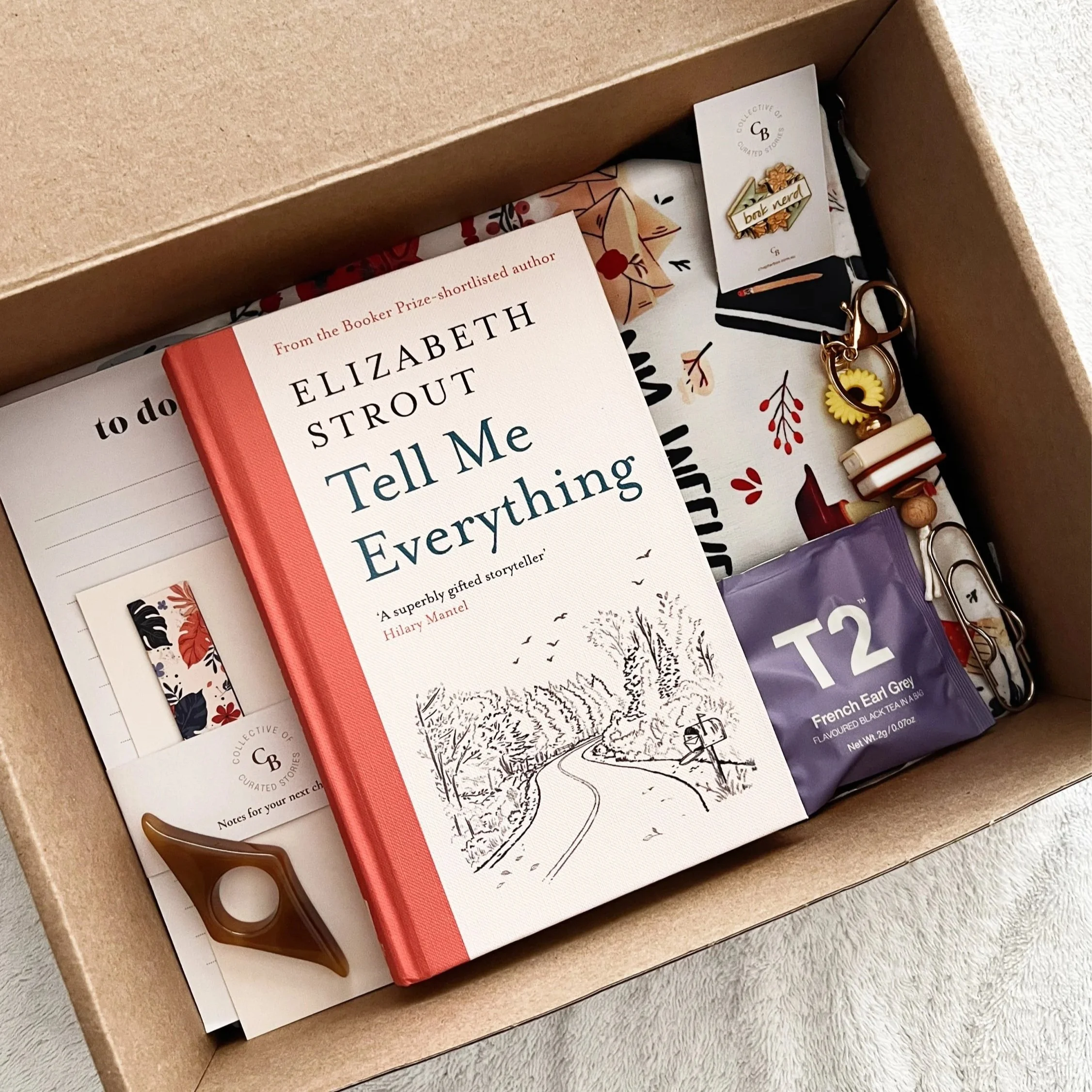 Book+box+with+book%2C+notepad%2C+pin%2C+page+holder%2C+tea+and+book+sleeve2.jpg
