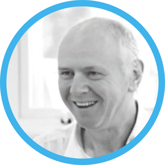 Motus VR's CEO, viewed in a black and white photo. He is in an indoor setting with a window in the background.