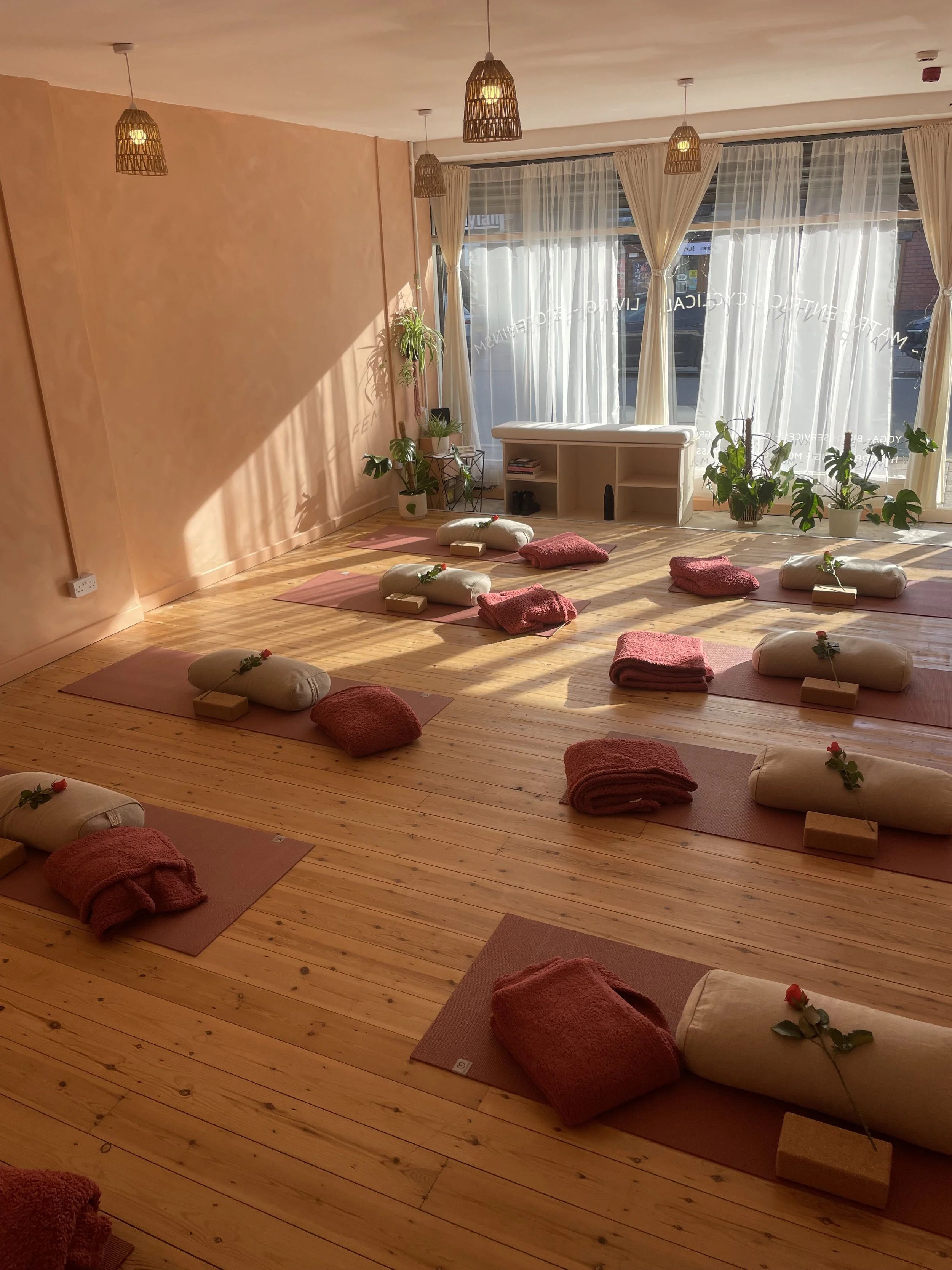 Warm yoga studio set up for a sensuality and sex education yin yoga workshop in Brisbane