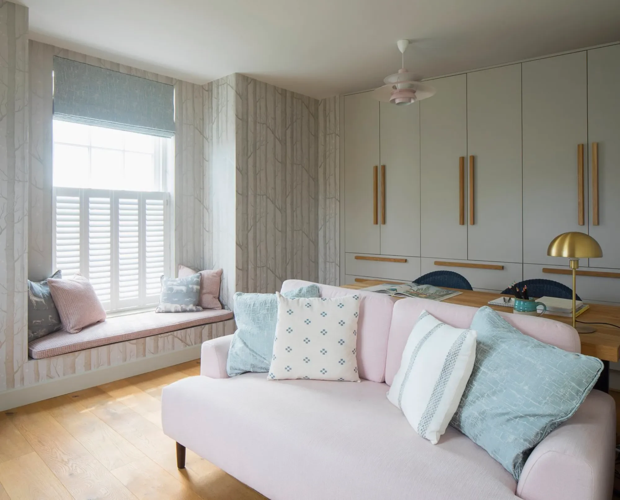 art-craft-room-with-sofa Kent Michelle Shakallis Interiors.webp