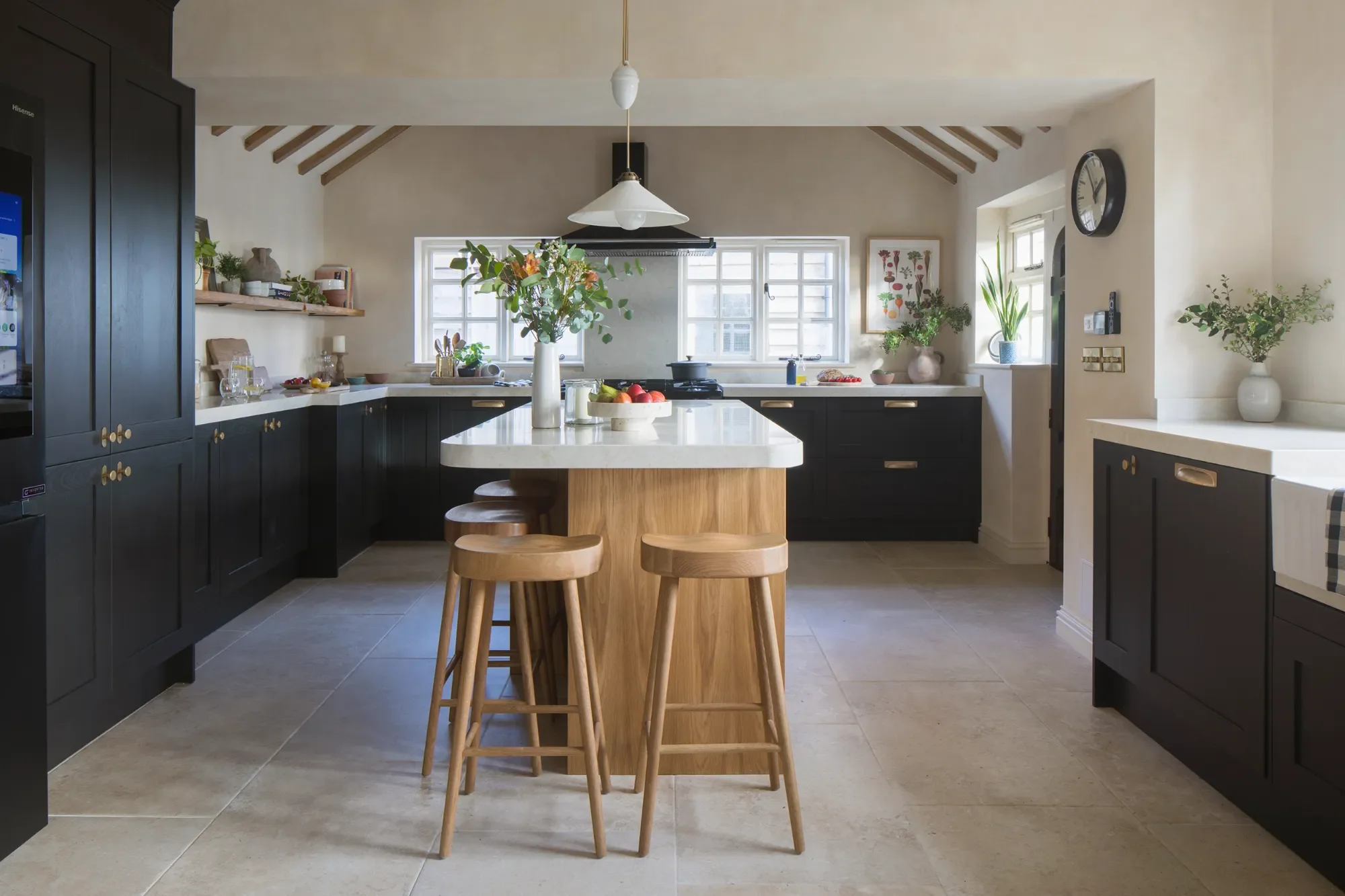 Black-country-kitchen-with-wooden-island-Kent-Michelle-Shakallis-Inteiors.webp