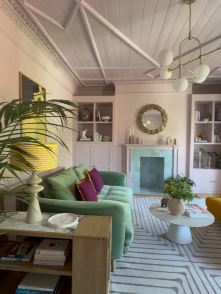 When designing a room, you need to think about every corner of the room and every detail. How the colours work together throughout the space and how and when you want to use the room. 

This room is a living room, a piano music room and as you can se