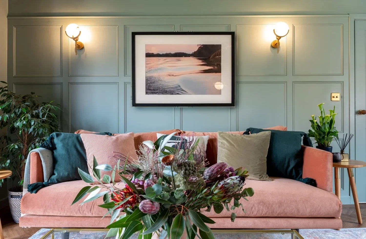 Green living room with orange sofa Michelle Shakallis Interiors.webp