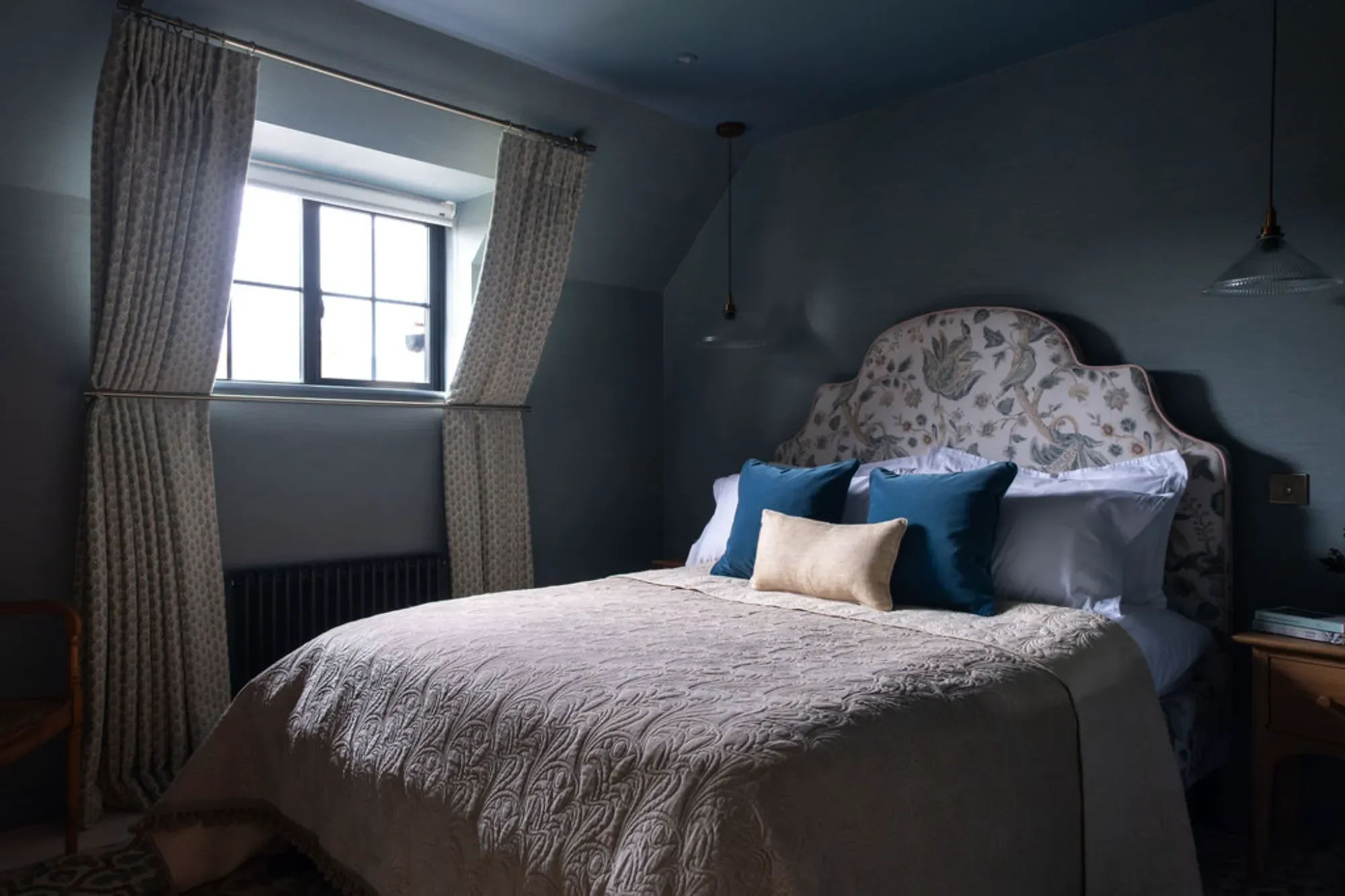 Blue bedroom with eaves window Michelle Shakallis Interiors.webp