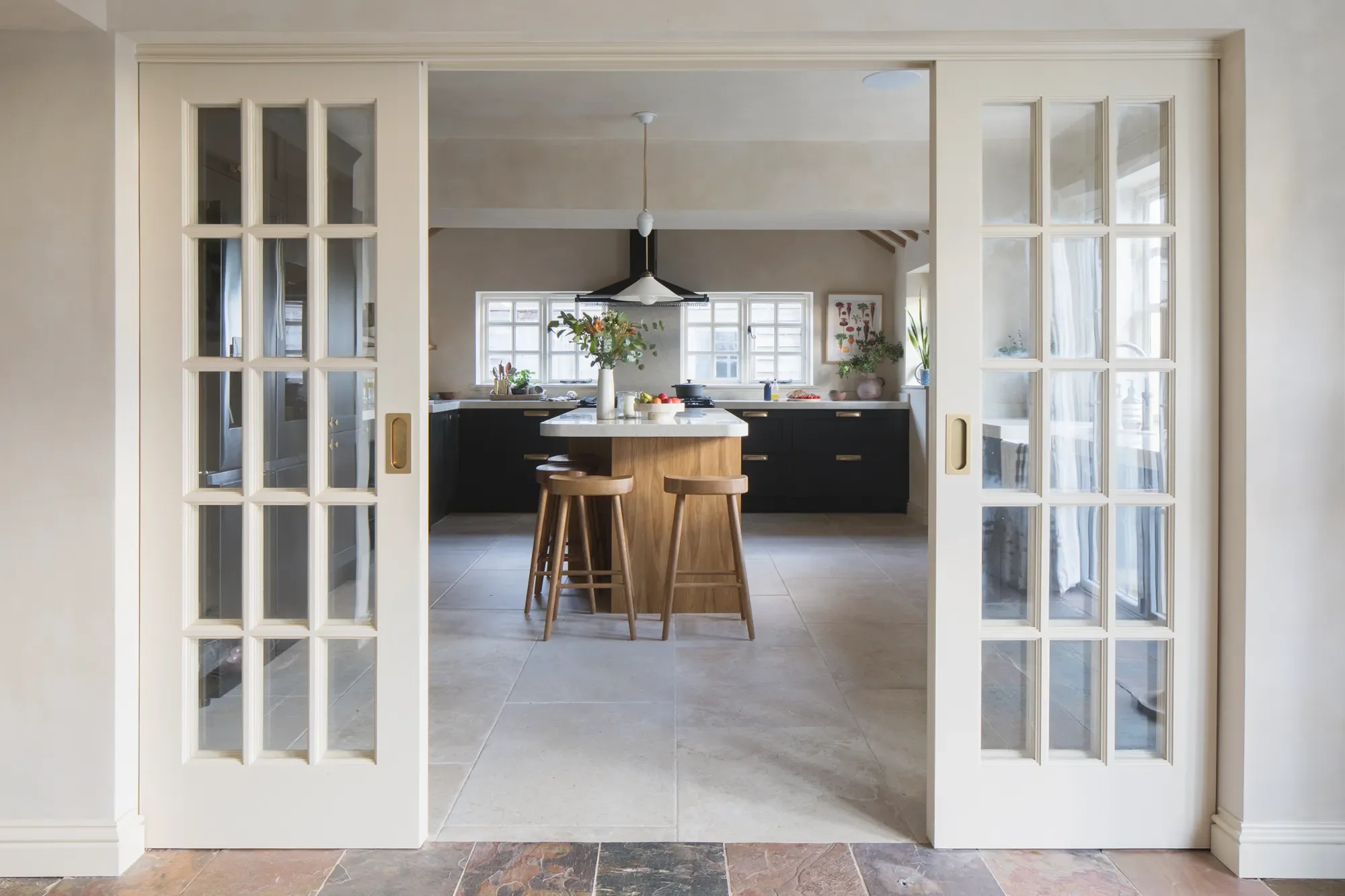 French-doors-to-a-country-kitchen-Kent-Michelle-Shakallis-Inteiors.webp