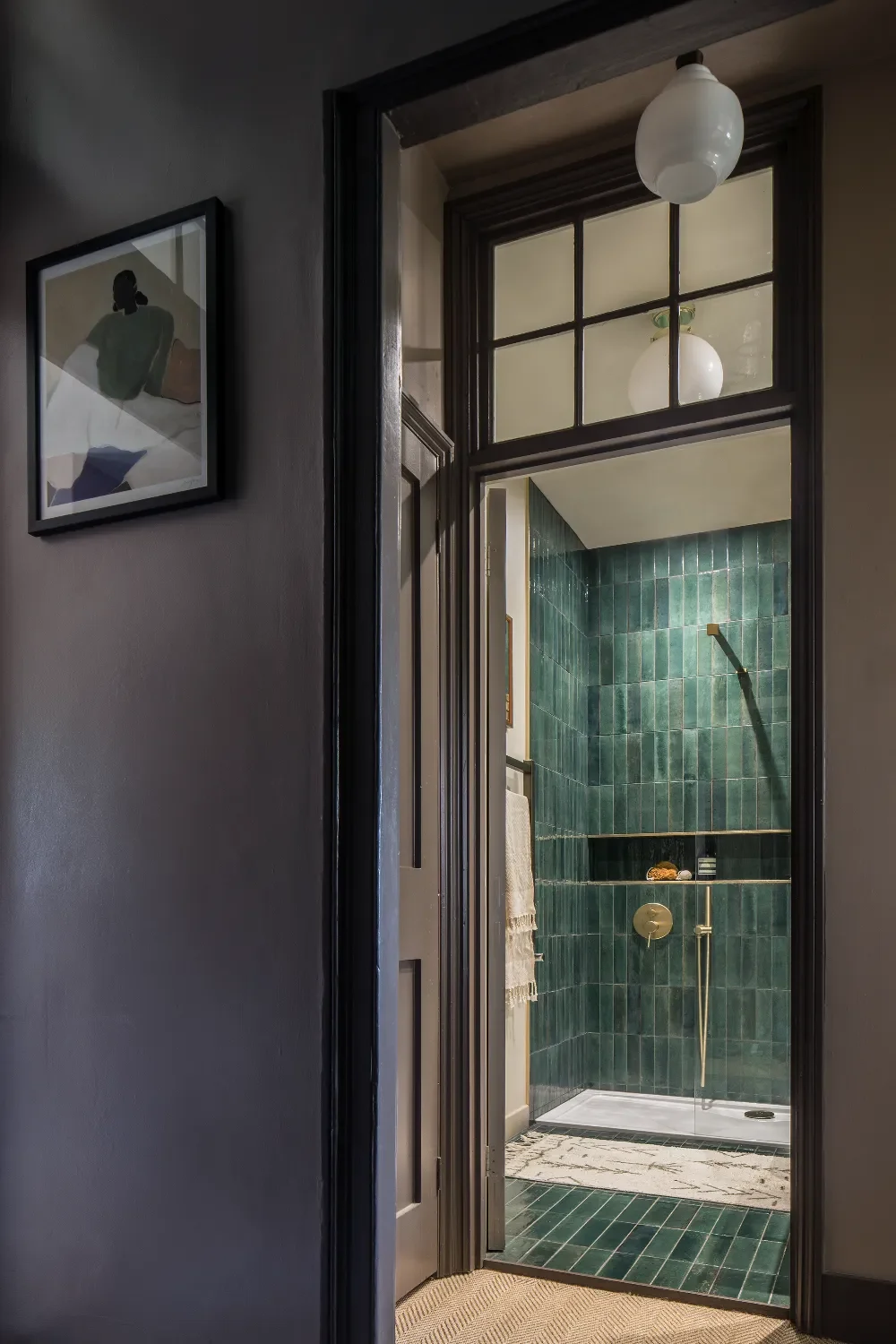 green-showerroom-from-hallway-interior-design-kent-michelle-shakallis.webp
