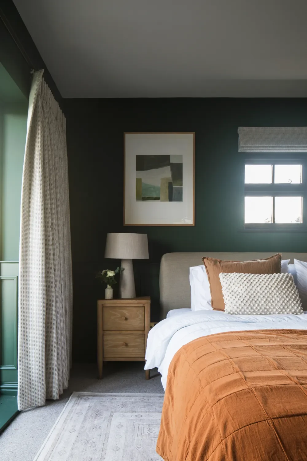 dark-green-bedroom-terracotta-throw-interior-design-kent-michelle-shakallis.webp