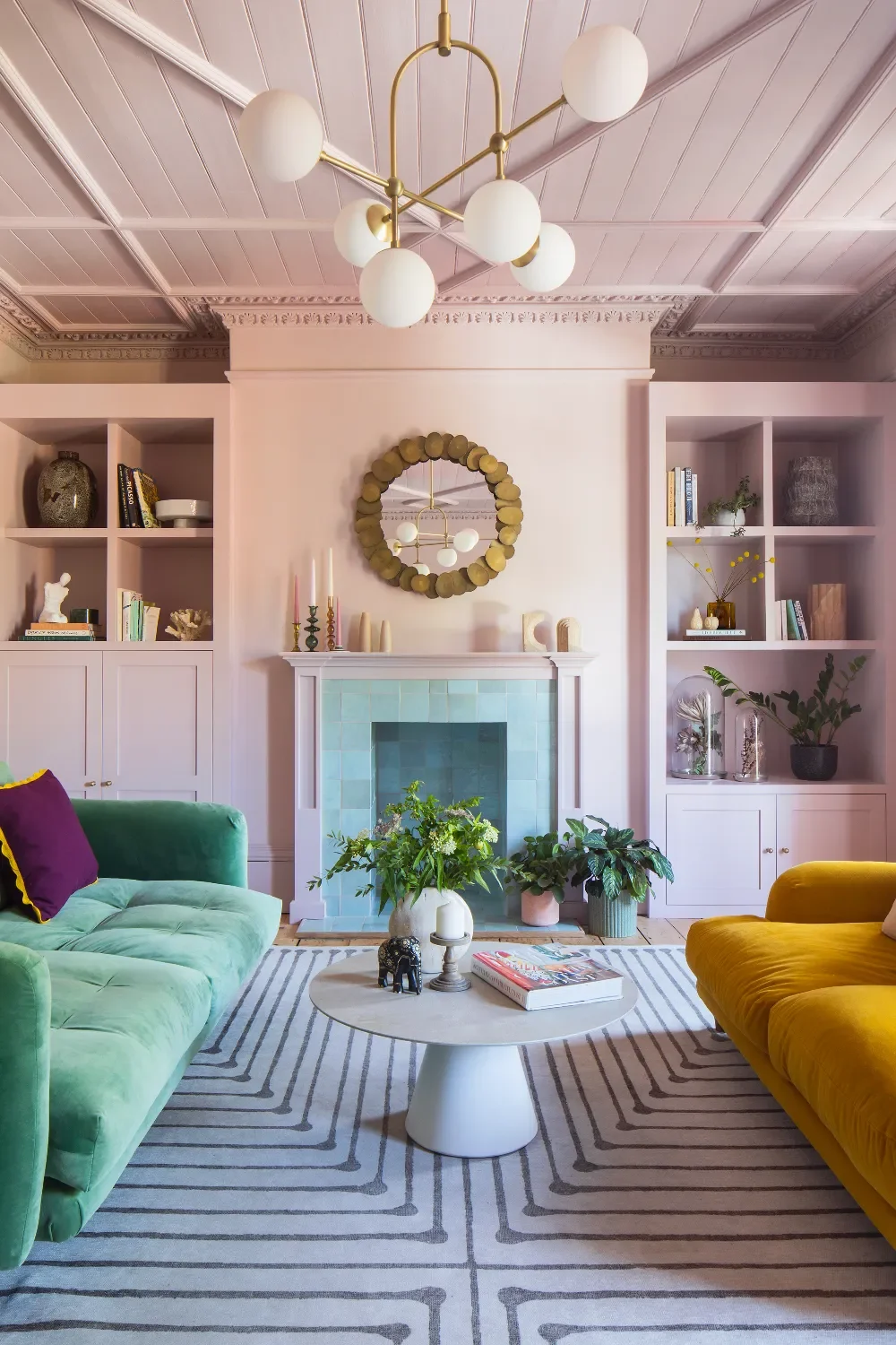 Pink-living-room-with-blue-fireplace-interior-design-kent-michelle-shakallis.webp