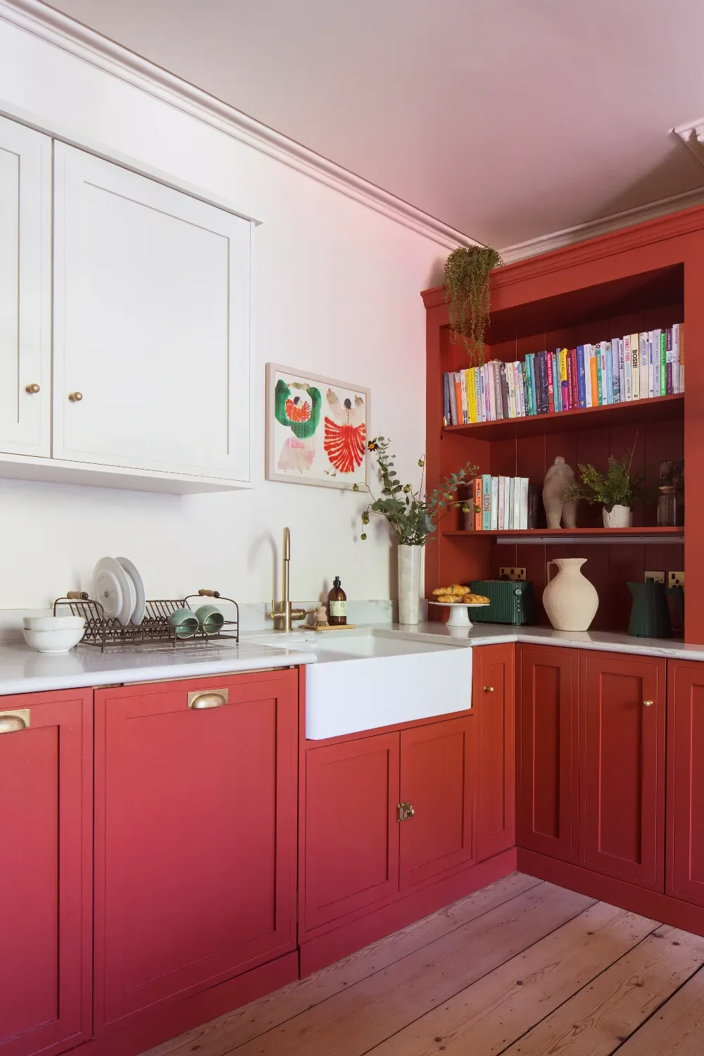 red-kitchen-with-sink-interior-design-kent-michelle-shakallis.webp