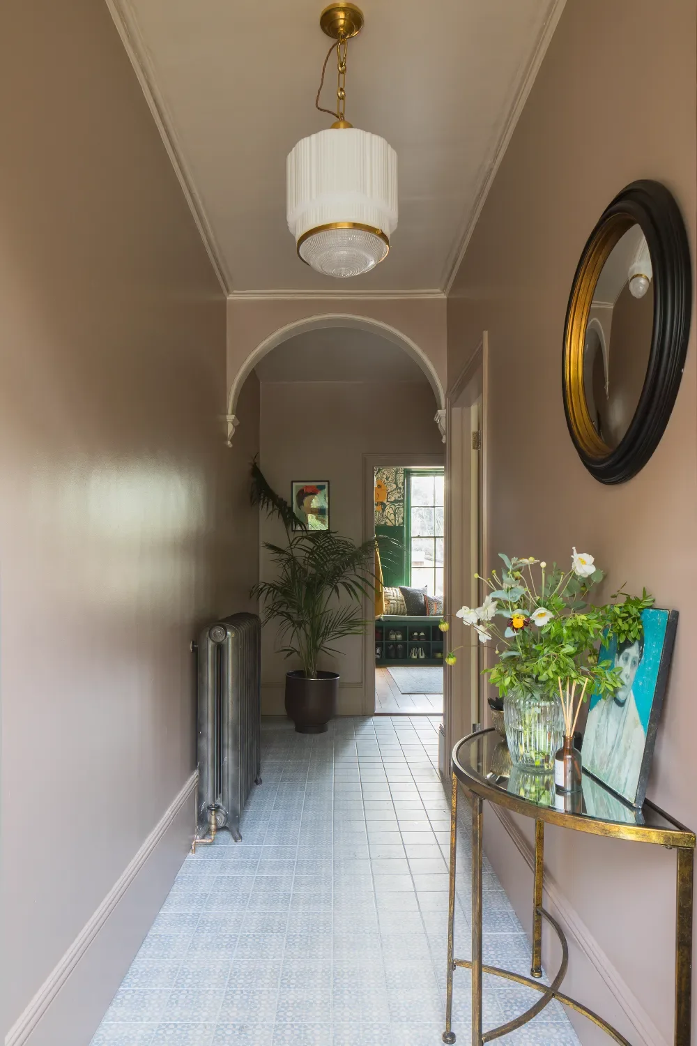 Entrance-hallway-with-period-arch-and-console-table-interior-design-kent-michelle-shakallis.webp