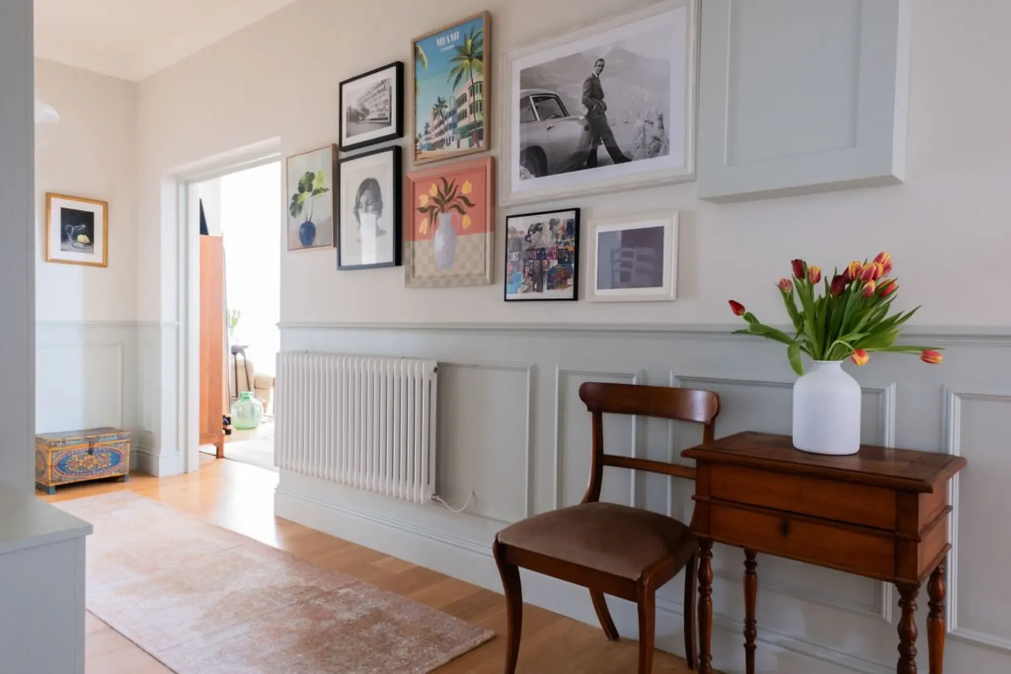 gallery wall hallway Kent Michelle Shakallis Interiors.webp