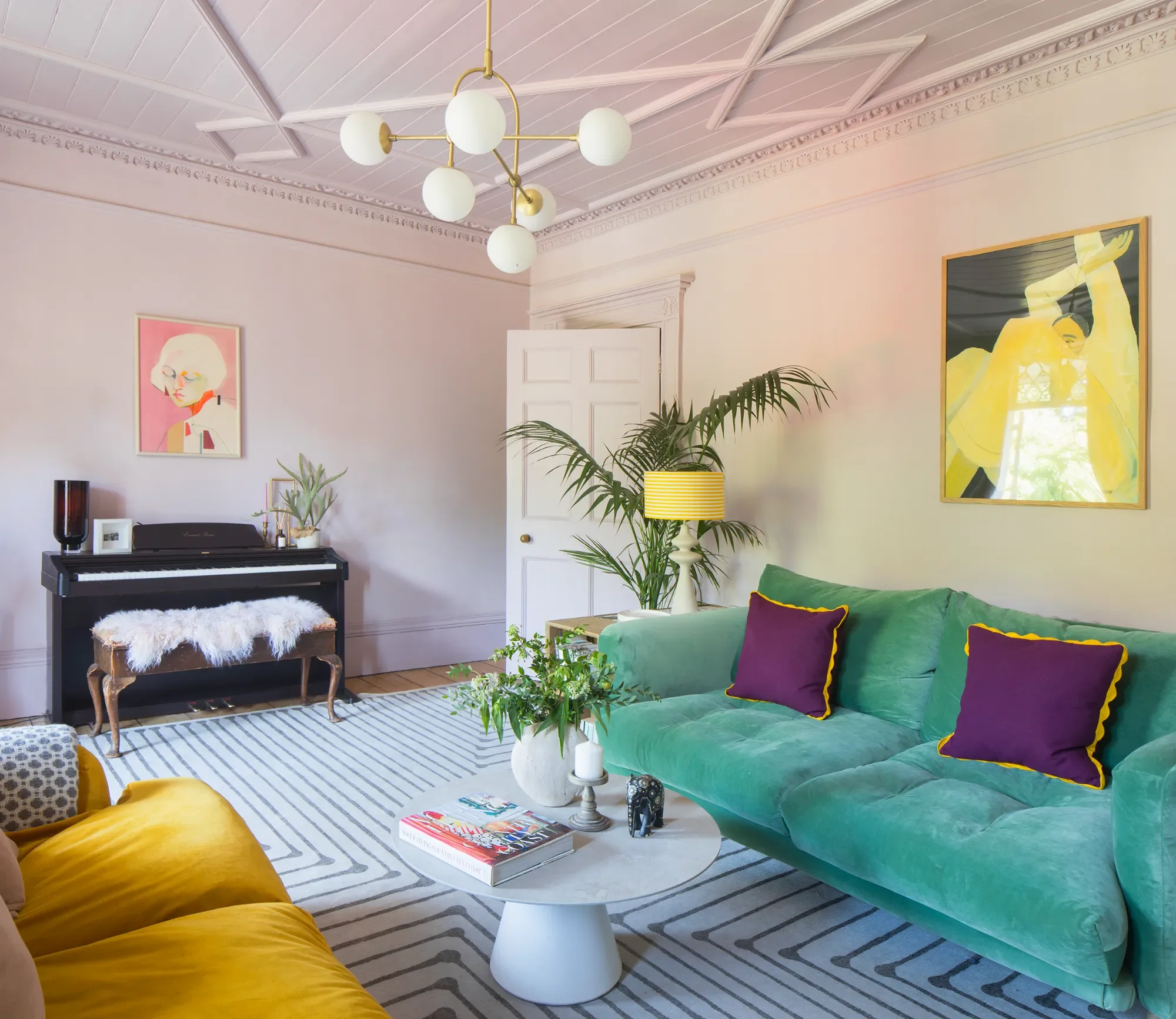 Pink-living-room-with-piano-and-green-sofa-interior-design-kent-michelle-shakallis.webp