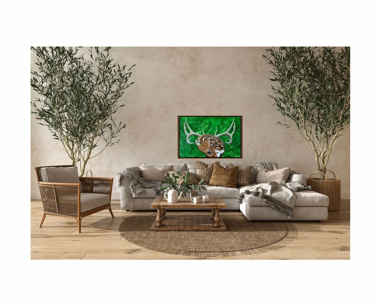 The fawn and antler painting hanging in a soft neutral living room showing how the green background adds warmth and nature to the space.
