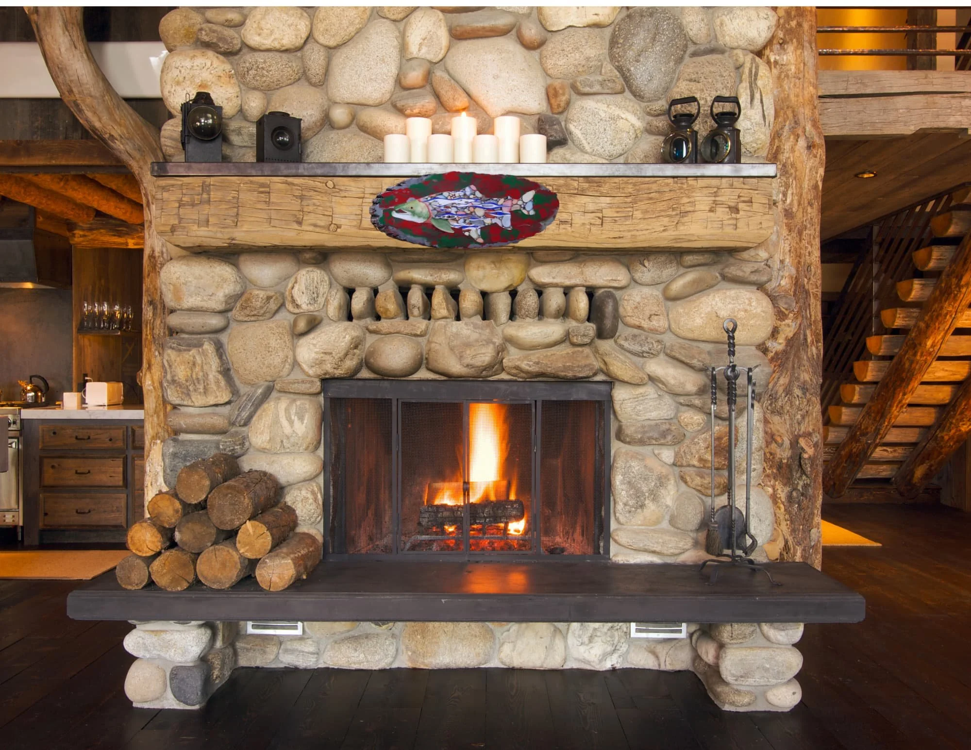 “Salmon Stream” by HL Wirtner shown above a stone fireplace to display scale and placement in a rustic home setting.