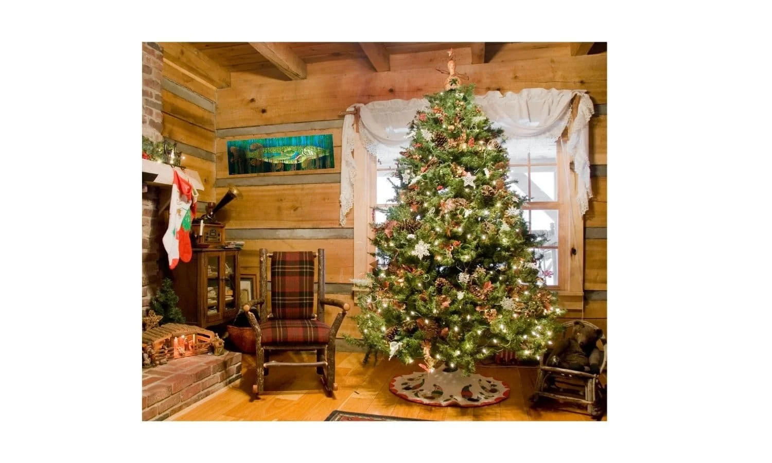 The artwork displayed in a cozy cabin living room decorated for Christmas, highlighting the pike painting’s bright colors against natural wood.