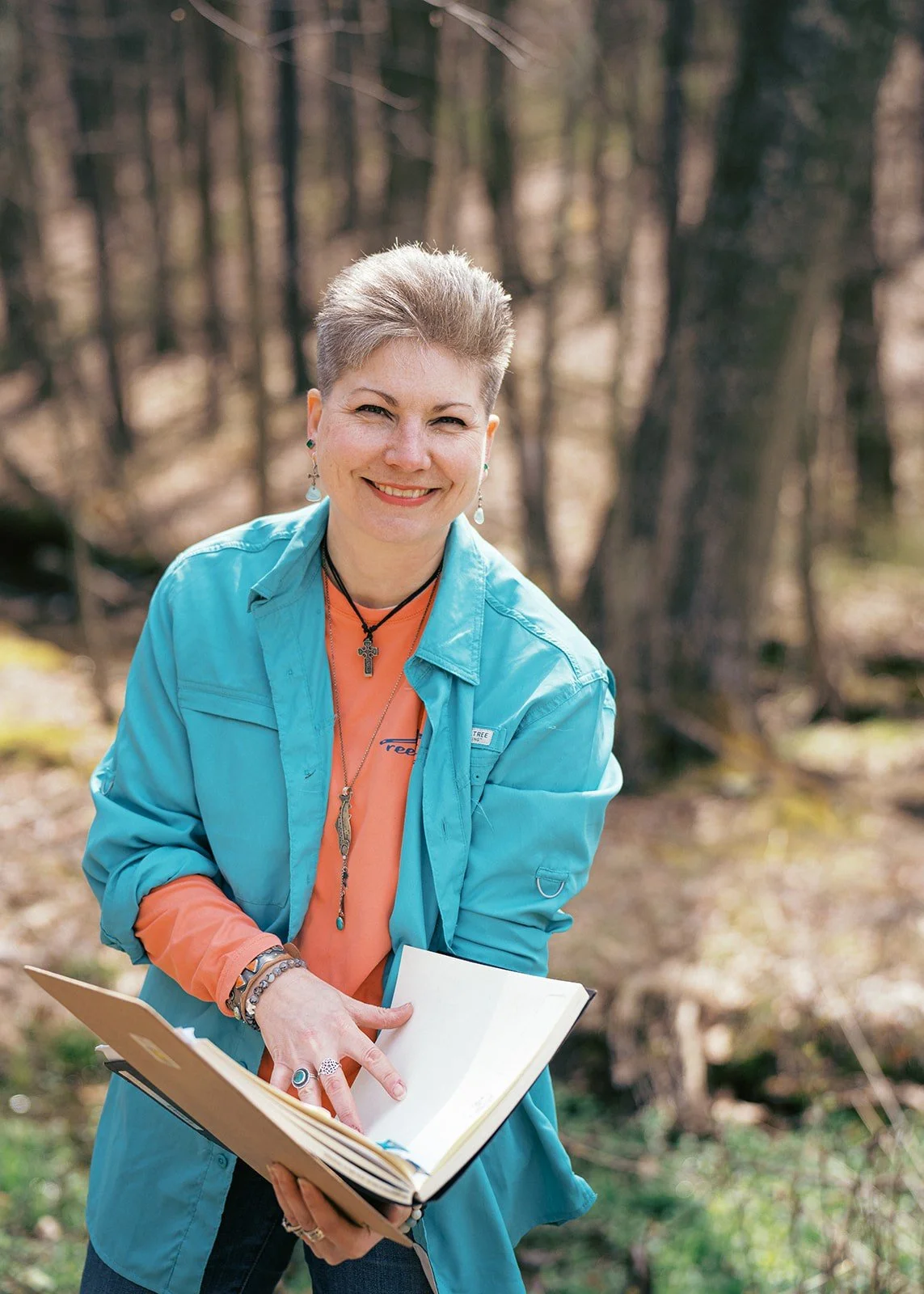 Portrait of HL Wirtner, The Fishing Artist, sketching outdoors in Western Pennsylvania. Mixed media artist creating fishing and wildlife art inspired by water and memory.
