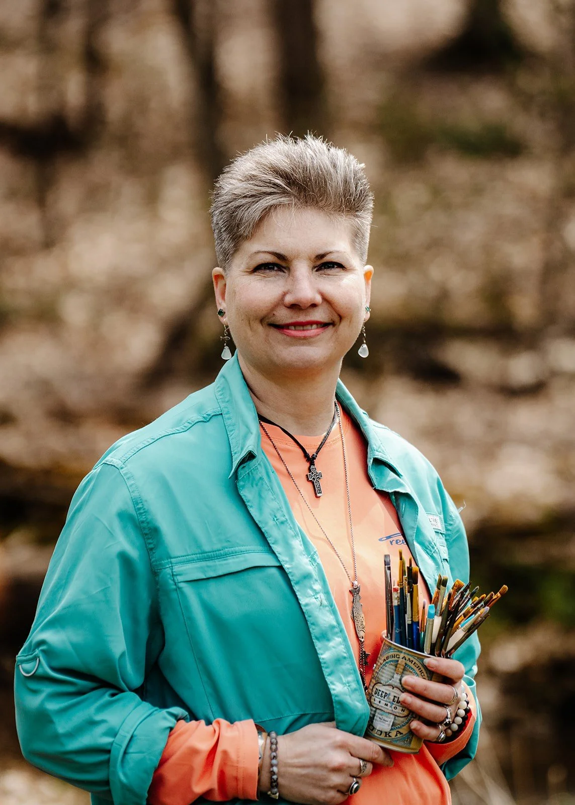 Portrait of HL Wirtner, The Fishing Artist, a mixed-media painter inspired by water, fish, and conservation.