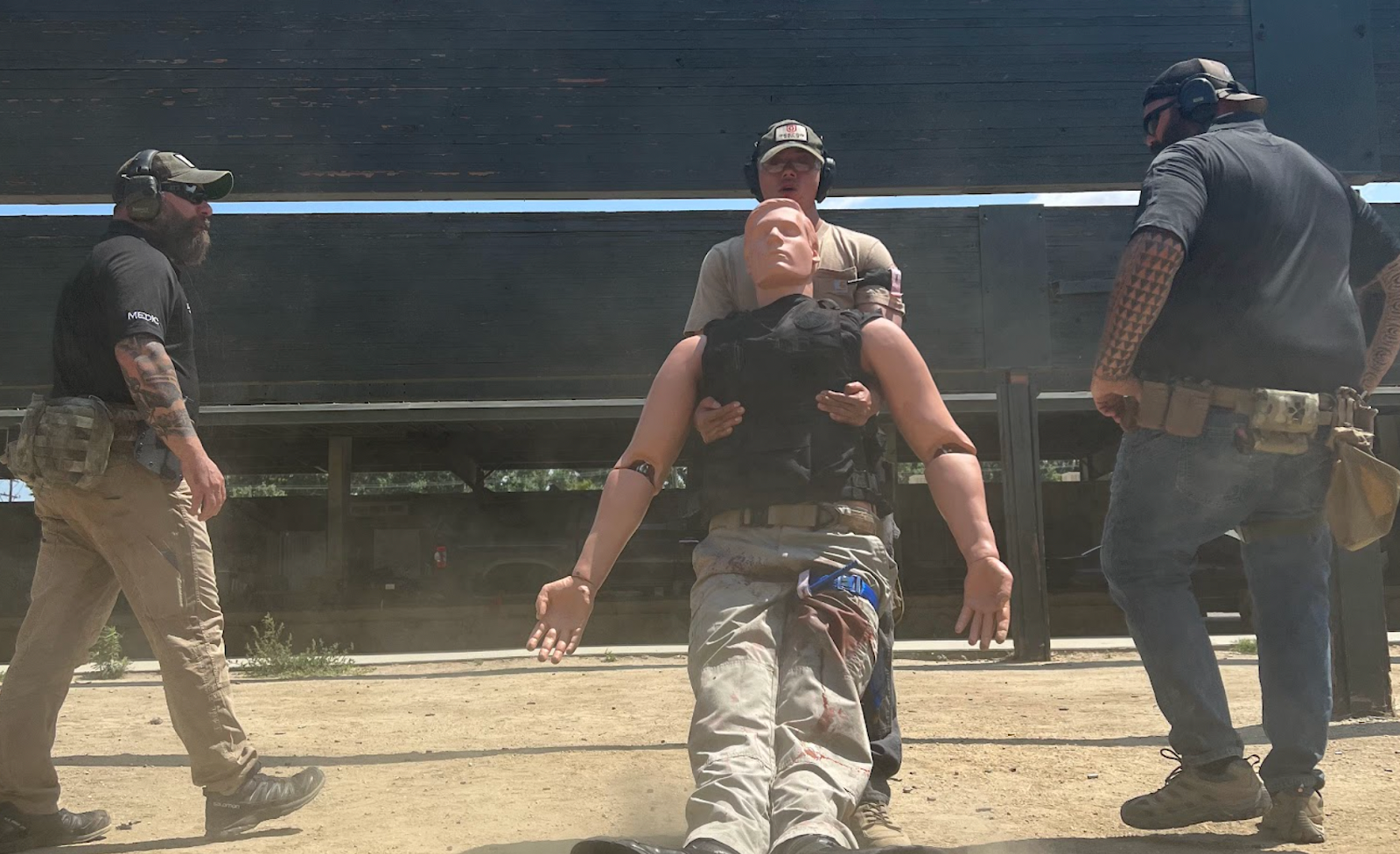 A person being resuscitated by emergency responders during a training exercise.