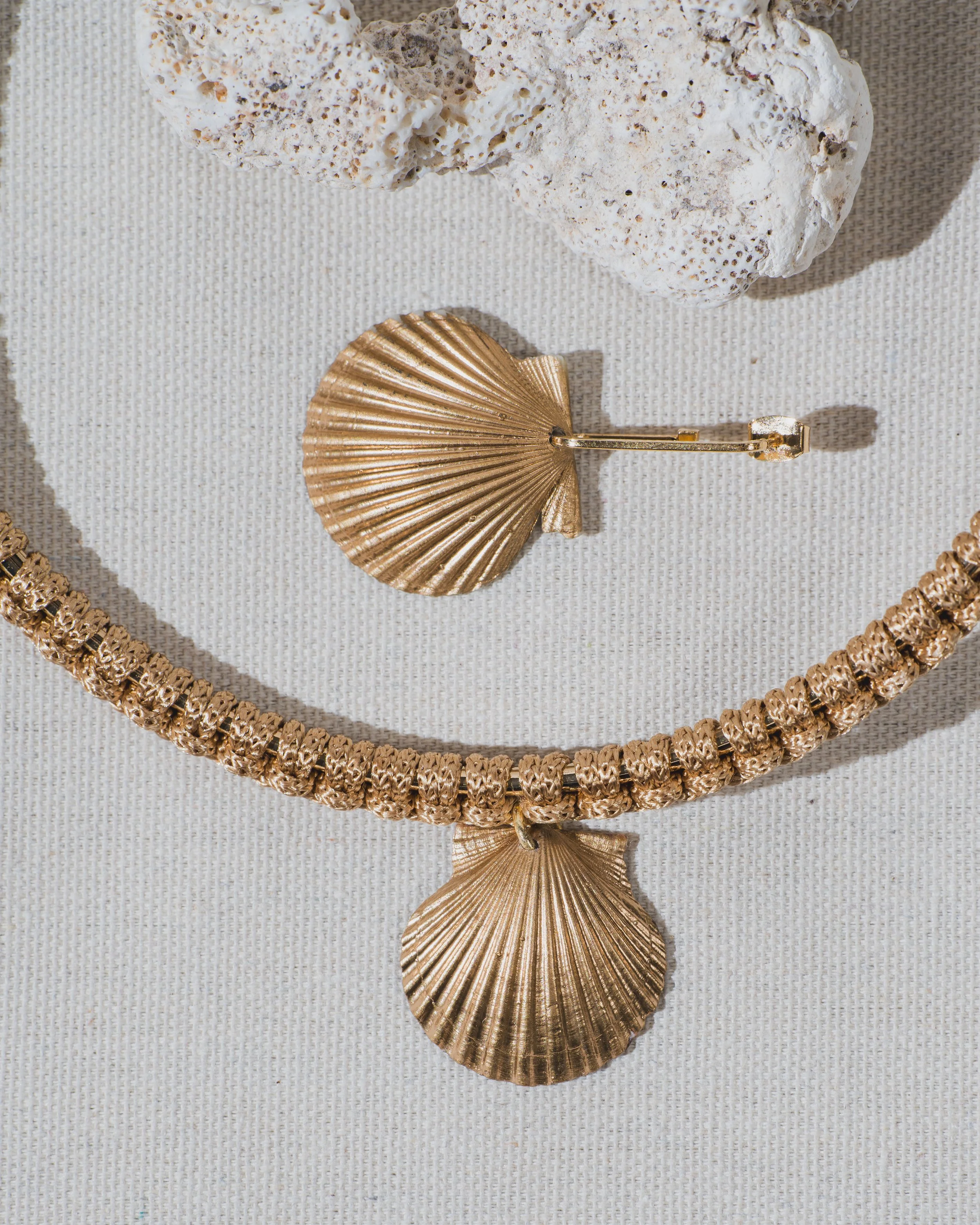 Handmade macrame gold seashell earrings and choker necklace found on nantucket, perfect for summer beach style.