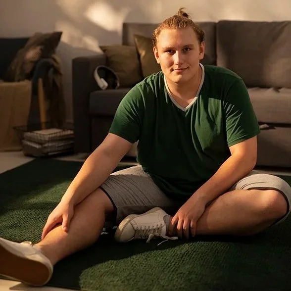NovaFit telehealth young man stretching