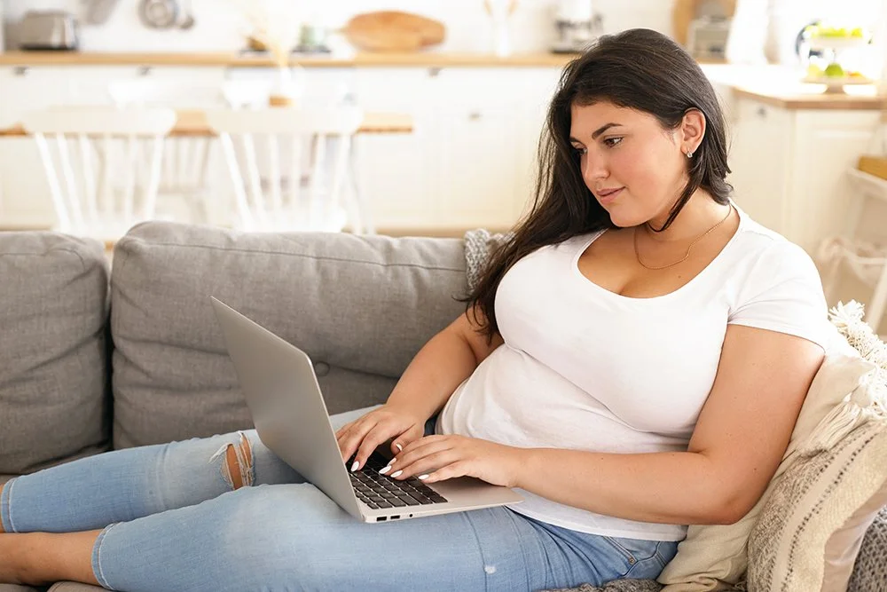 NovaFit telehealth young woman on laptop