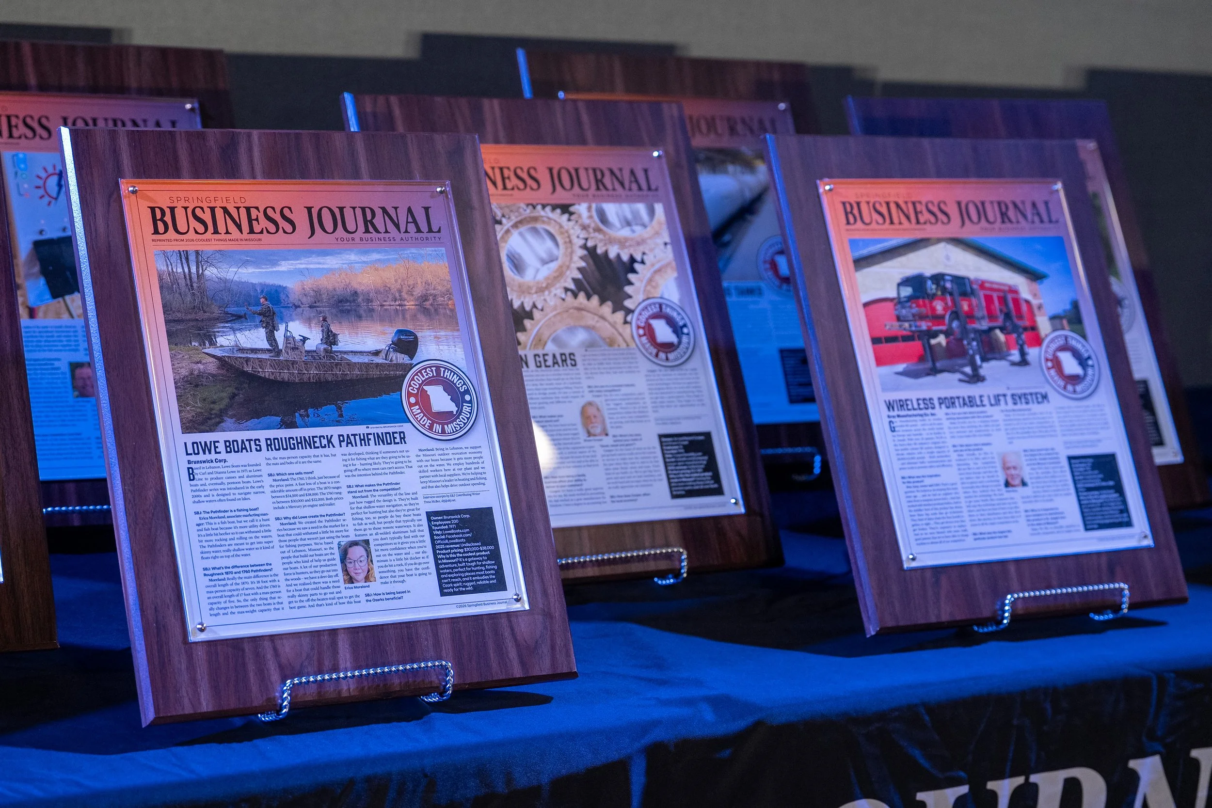 Plaques that display profiles of the 16 honorees from Coolest Things Made in Missouri