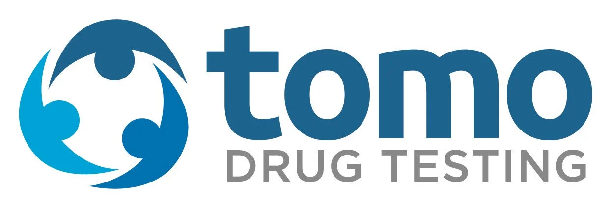 Logo of Tamo Drug Testing featuring a circular emblem with abstract human figures in shades of blue, with the company name in bold blue letters and 'Drug Testing' in gray.