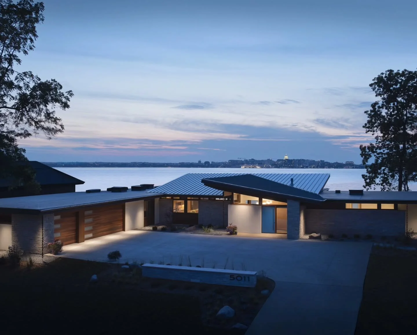 We have finished construction on the Lake Monona custom home!  We were pinching ourselves in disbelief when we got the chance to design a new home on this lake with incredible views across the water of downtown Madison and the Capitol building. 

Thi