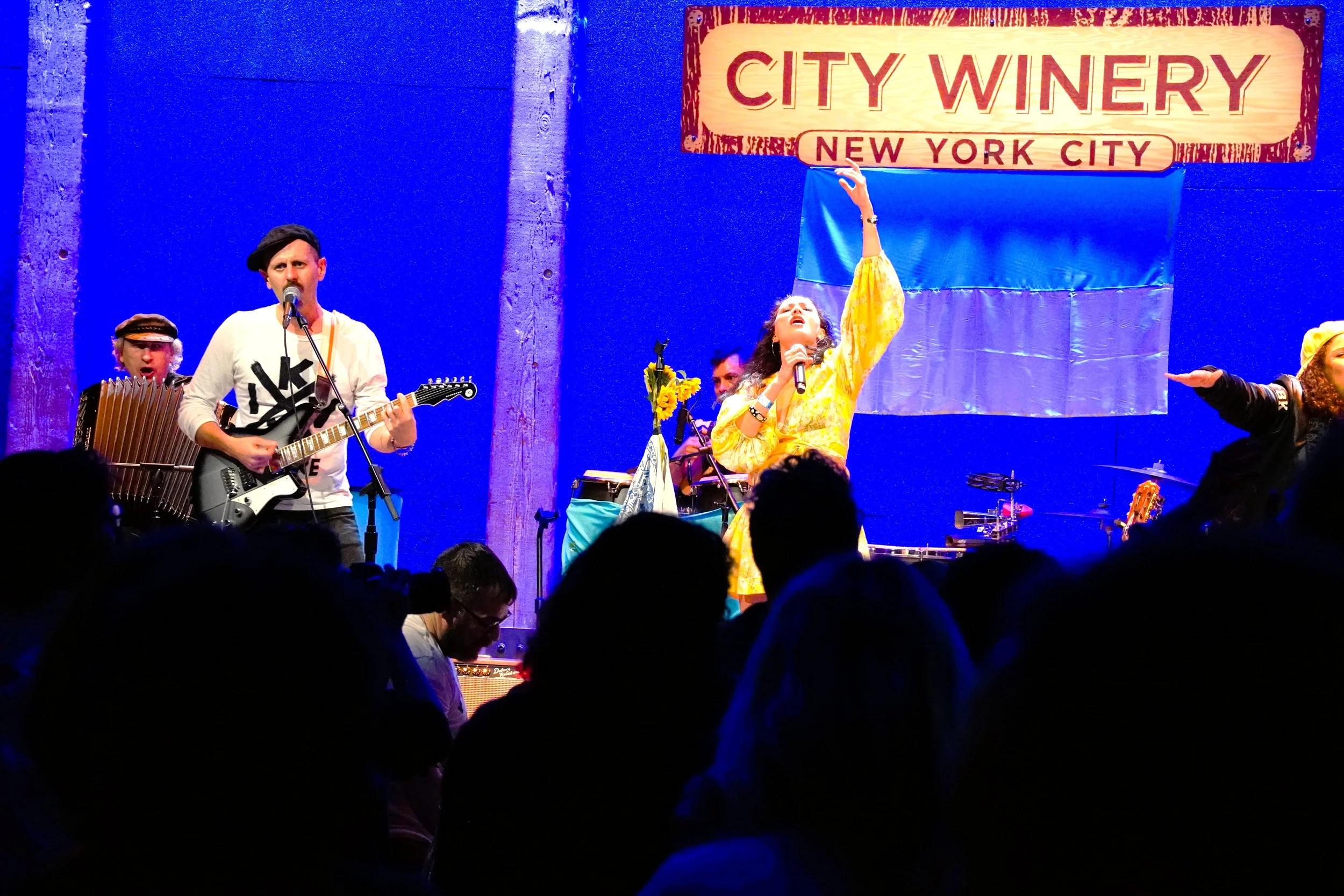 Pamela Racine performing with Gogol Bordello