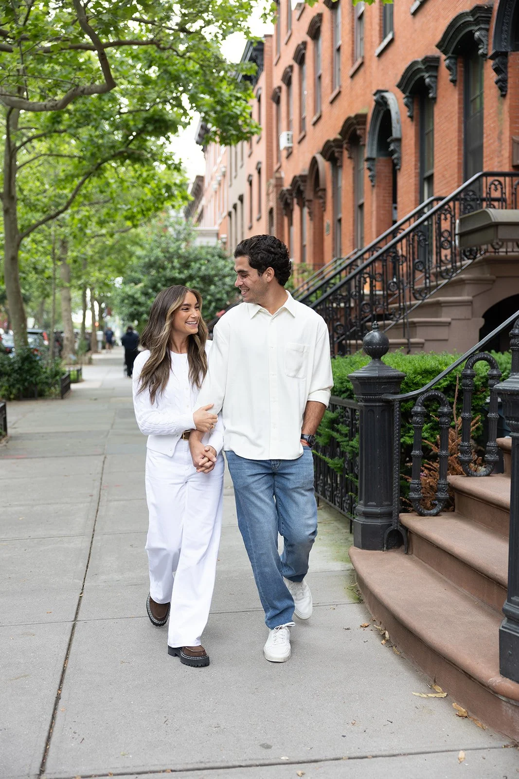Couple walking together in New York City, representing connection in couples therapy