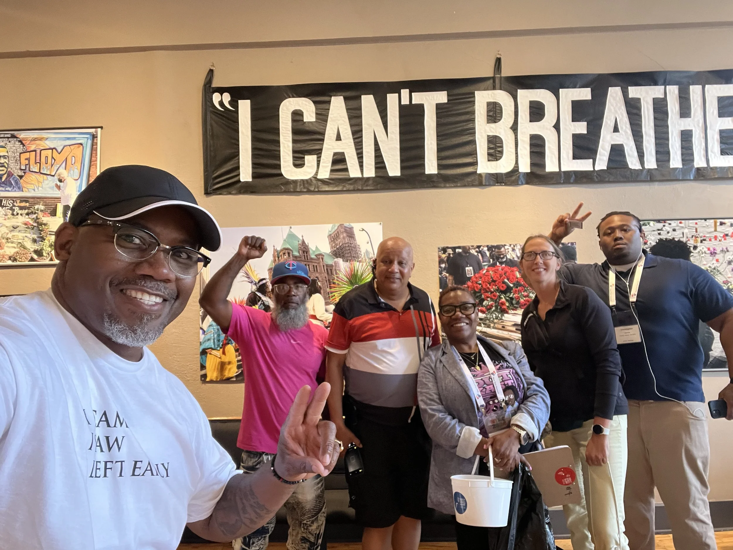 In discussion with the curator of the George Floyd exhibit.