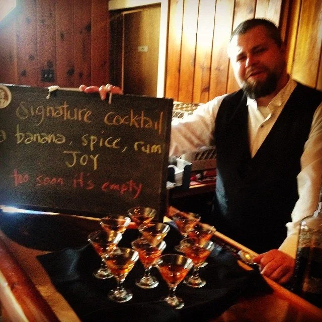 Bartender gets in on the fun: Signature cocktail - a banana, spice, rum JOY! - too soon it's empty!