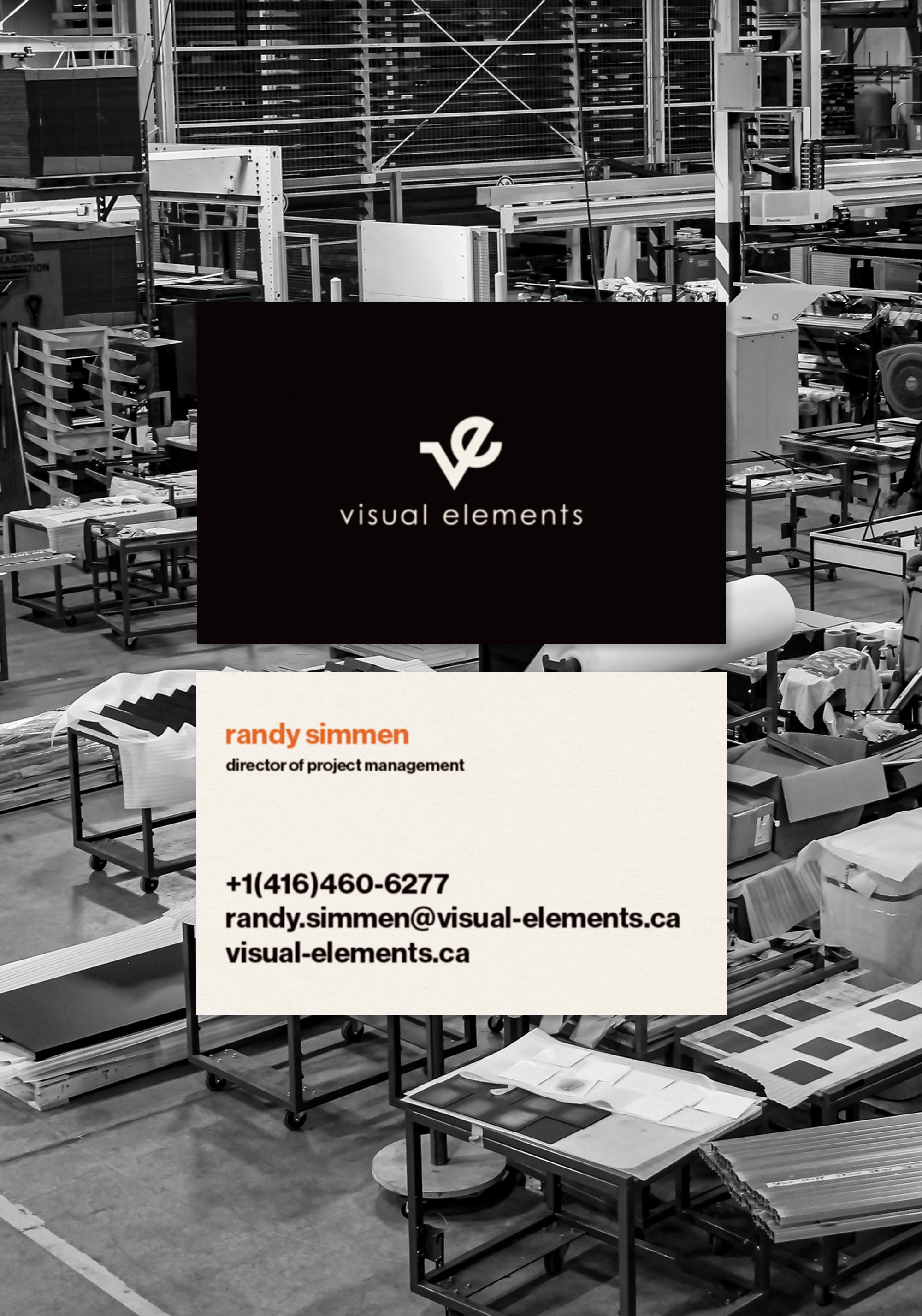 Business cards and marketing materials for visual elements on display in an industrial or workshop space.