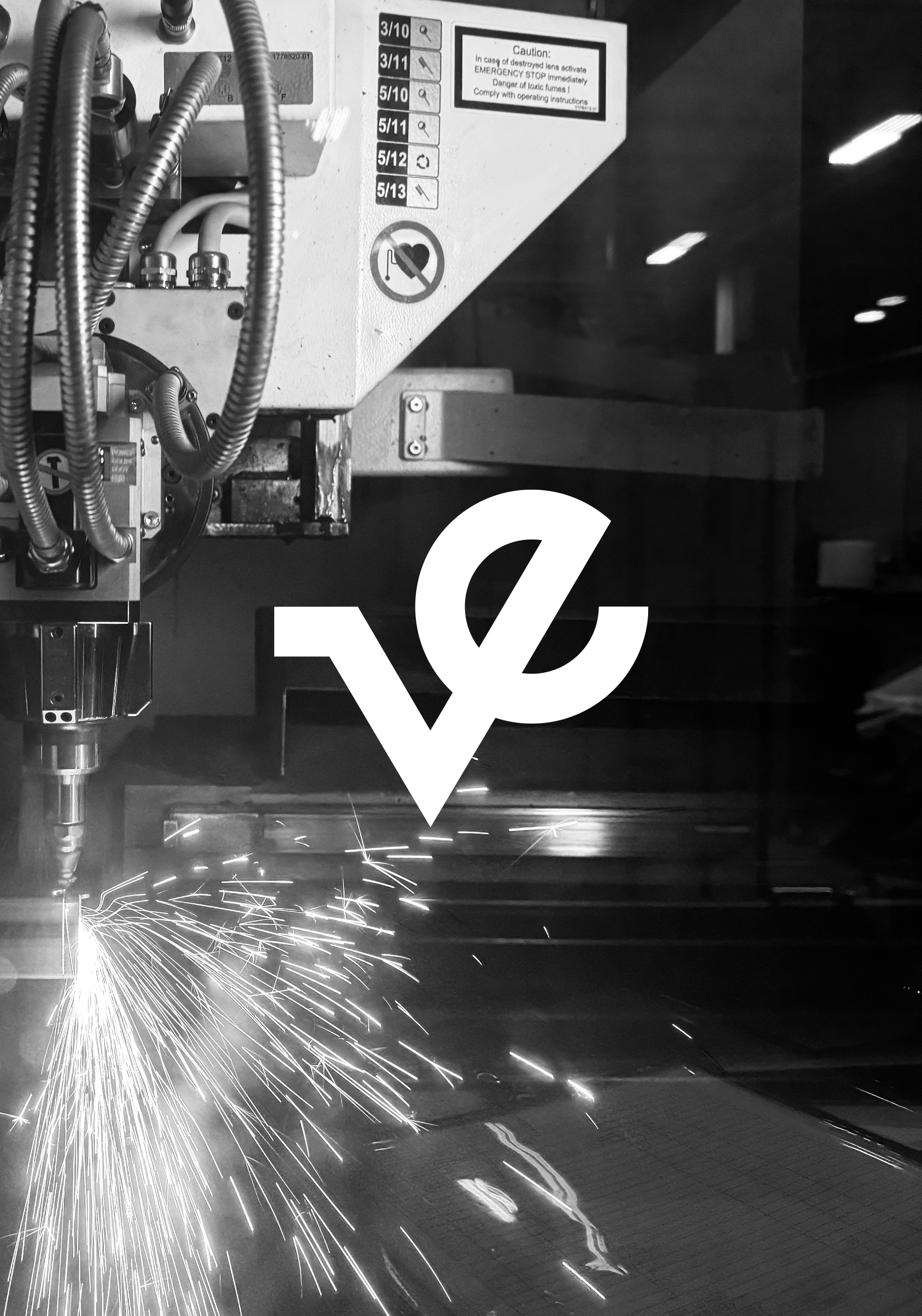 A welding machine performing a welding process on a metal surface, with sparks flying.
