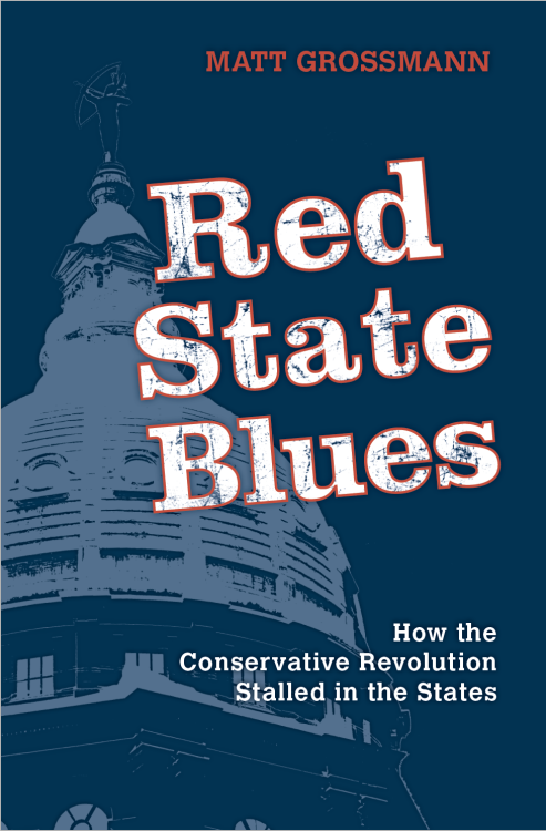 Red State Blues book cover depicting a state building in white in a dark blue background.