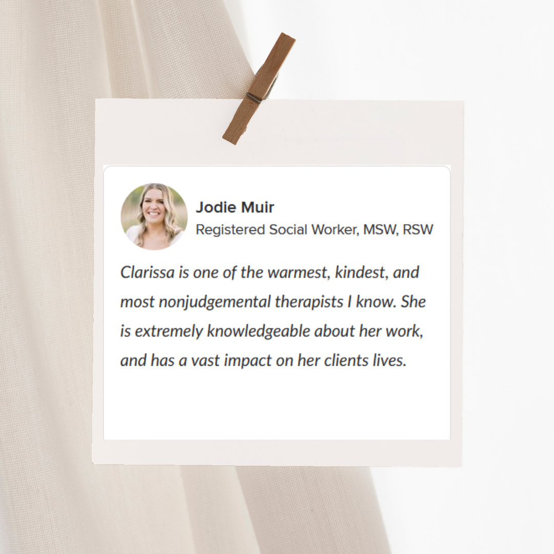 A white card hanging on a clothespin with a profile picture and a testimonial for Jodie Muir, a registered social worker, praising Clarissa as a warm, kind, and knowledgeable therapist.